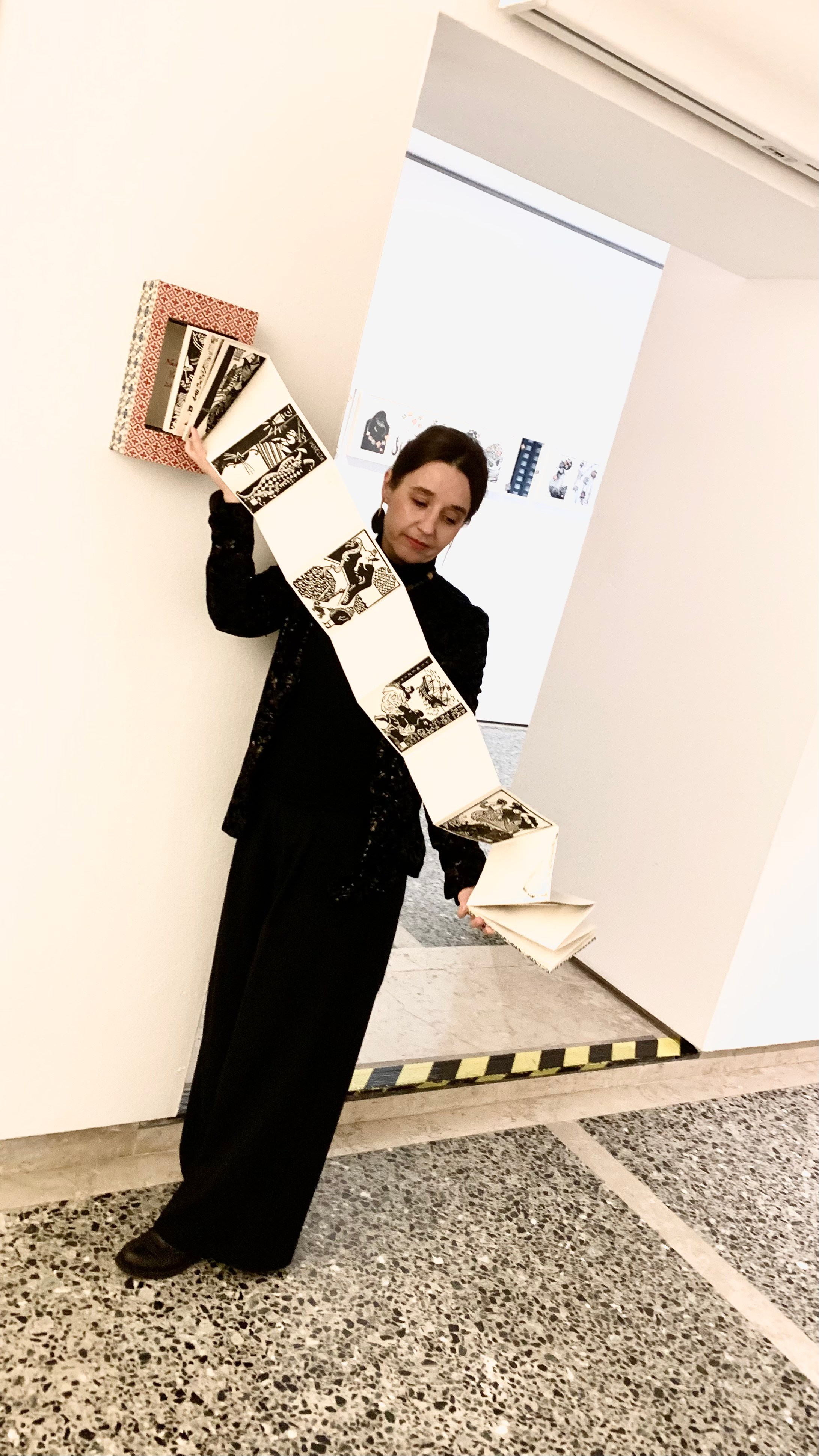 Nadia Kuprina with her artist book Leporello Veneziano at the Illustration Exhibition in Venice, January 2025