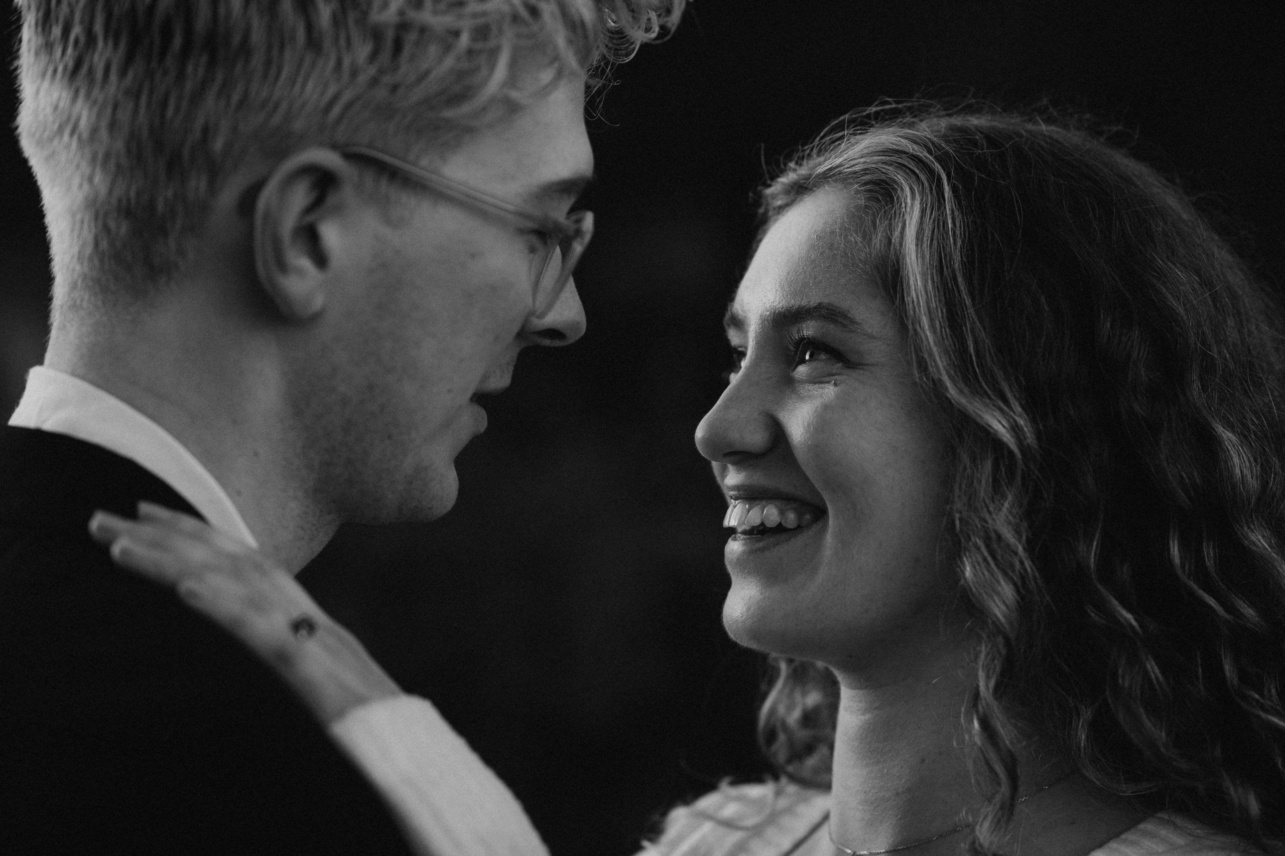 bride and groom smiling