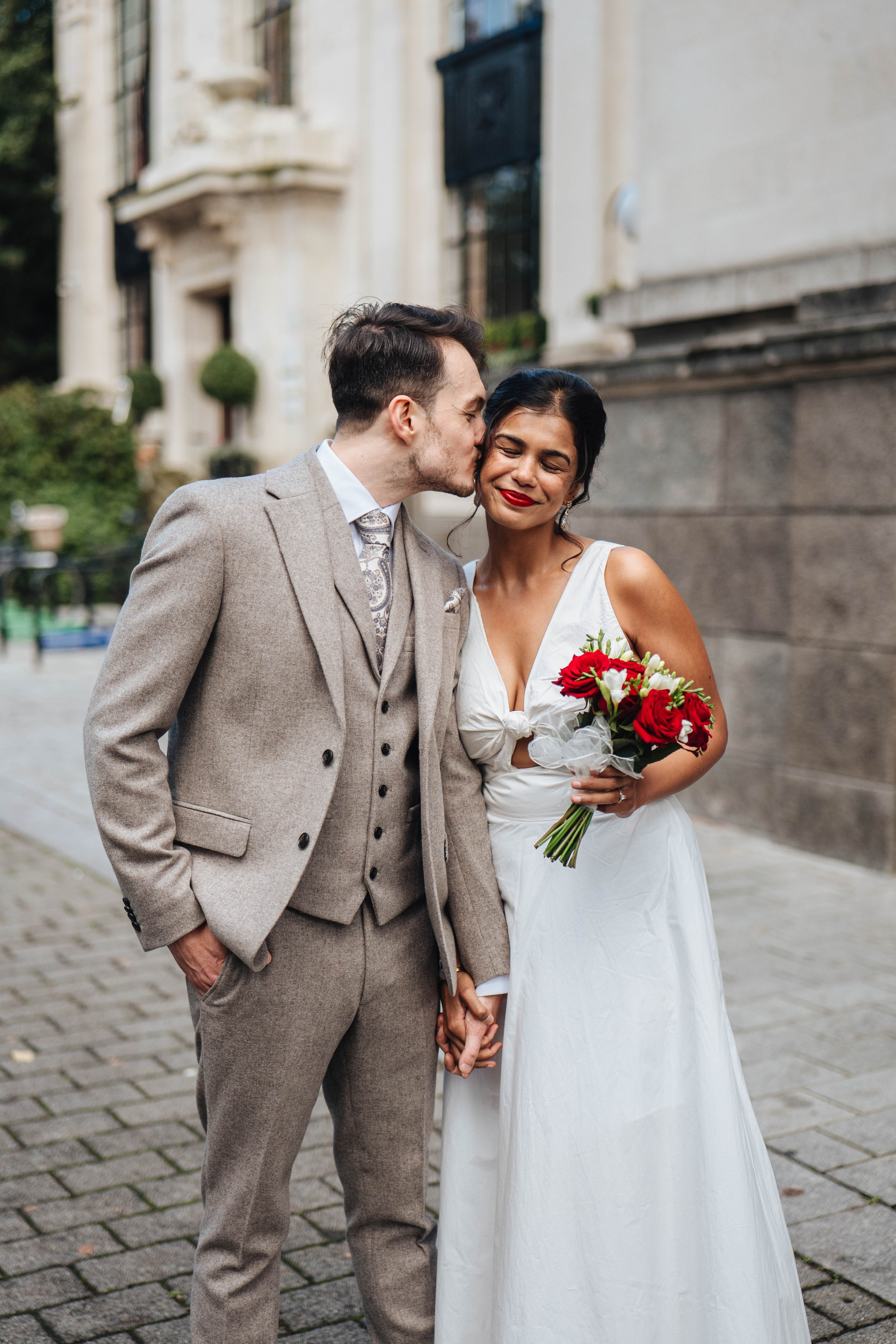 Wedding photography in london, bride and groom, red lips