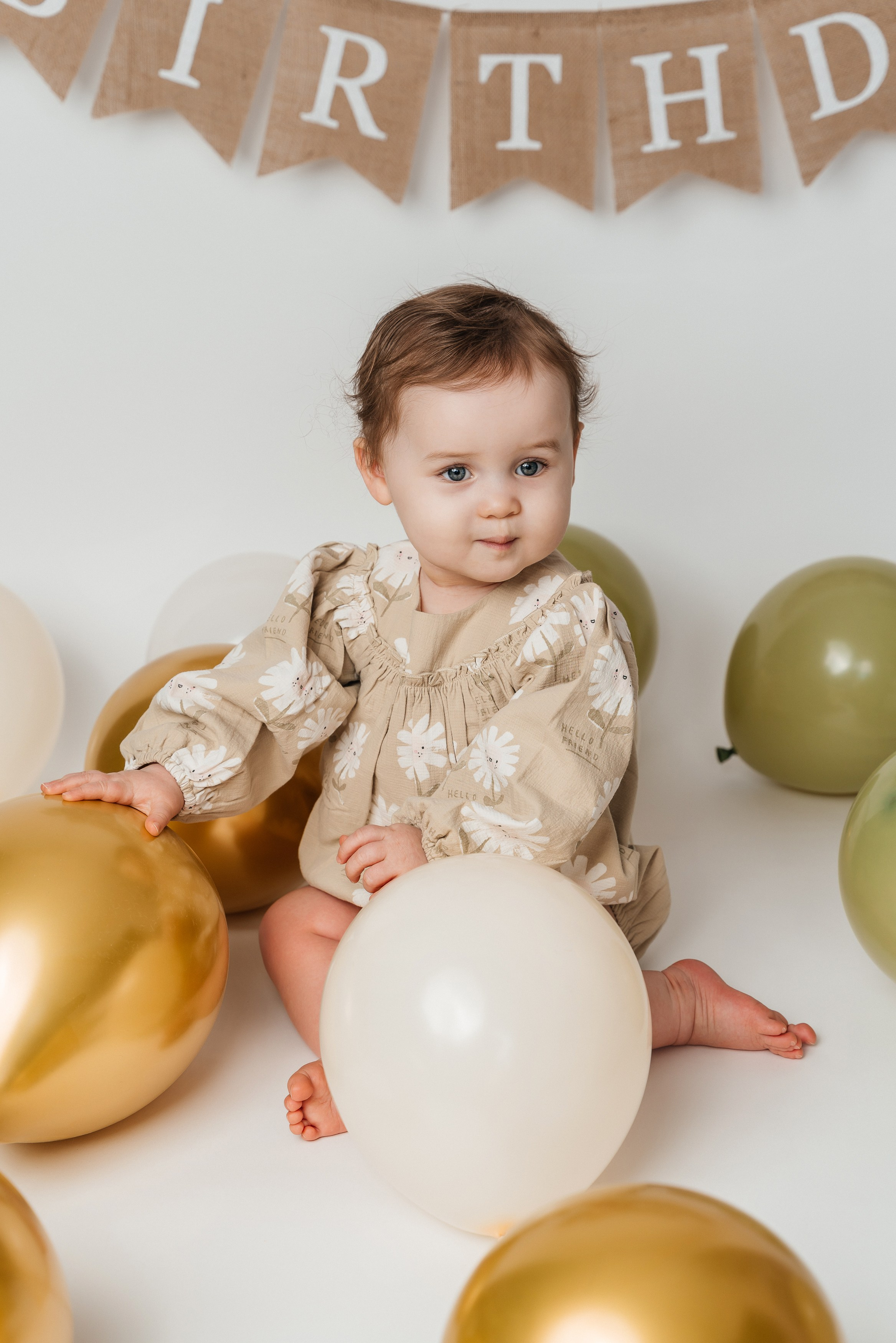 Studio photoshoot for Valentina 1 year old girl. Photographer in England Ekaterina Romanova