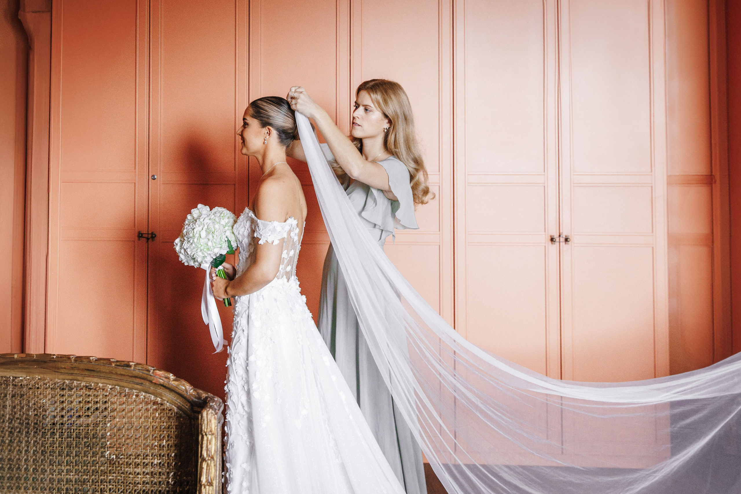 Bride is getting ready for the wedding ceremony in a stunning venue in Spain. 