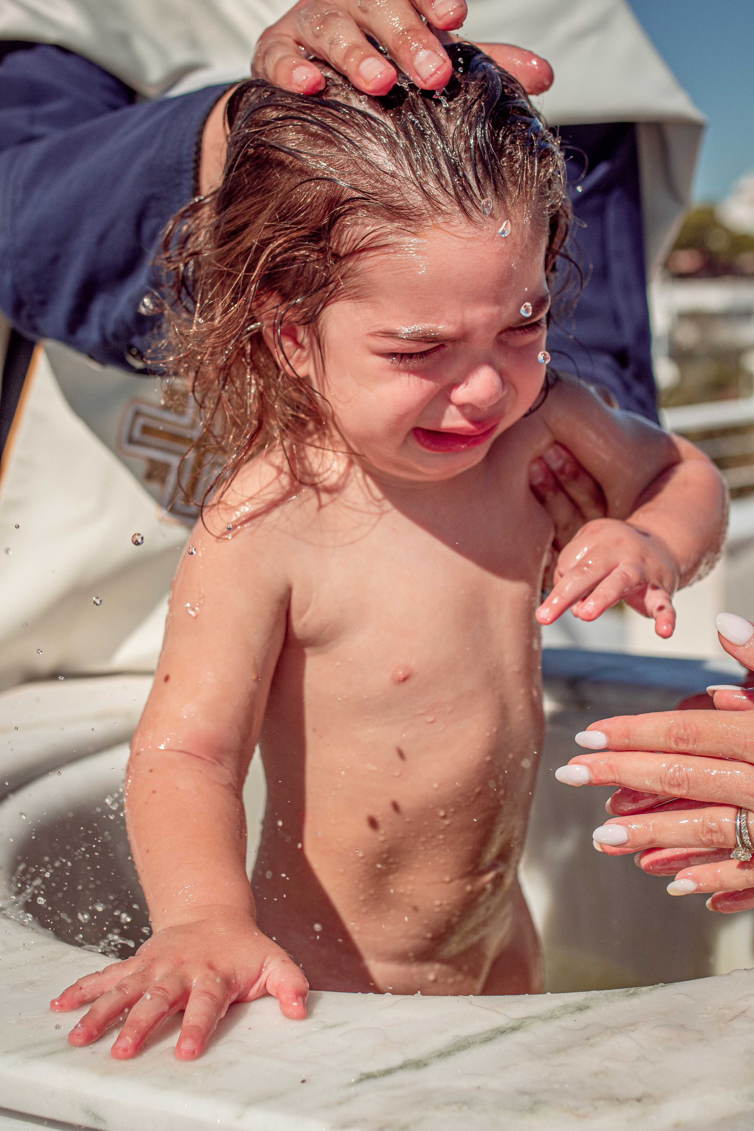 Baptism at Porto Cheli. Family Photographer in Greece