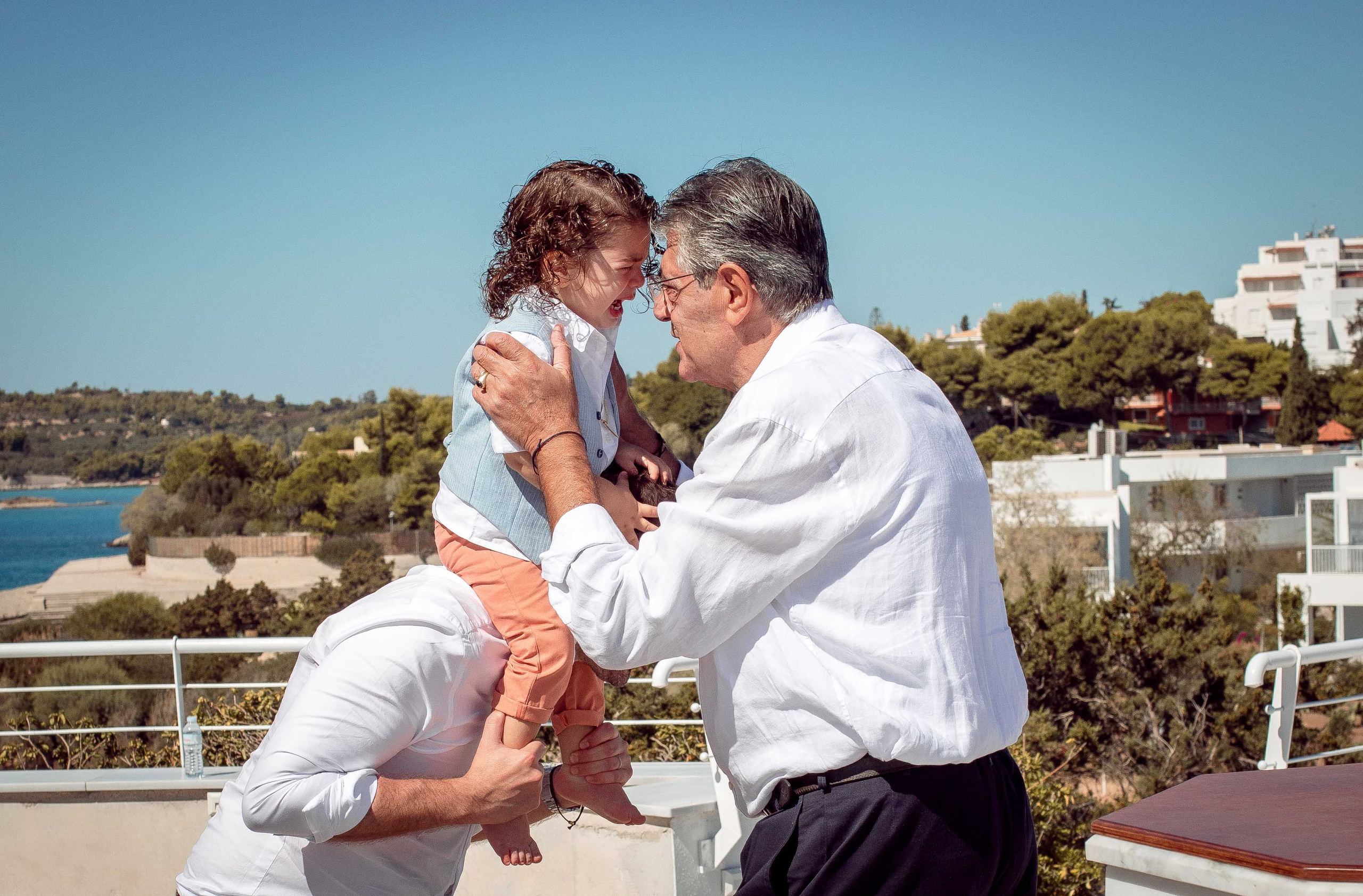 Baptism at Porto Cheli. Family Photographer in Greece