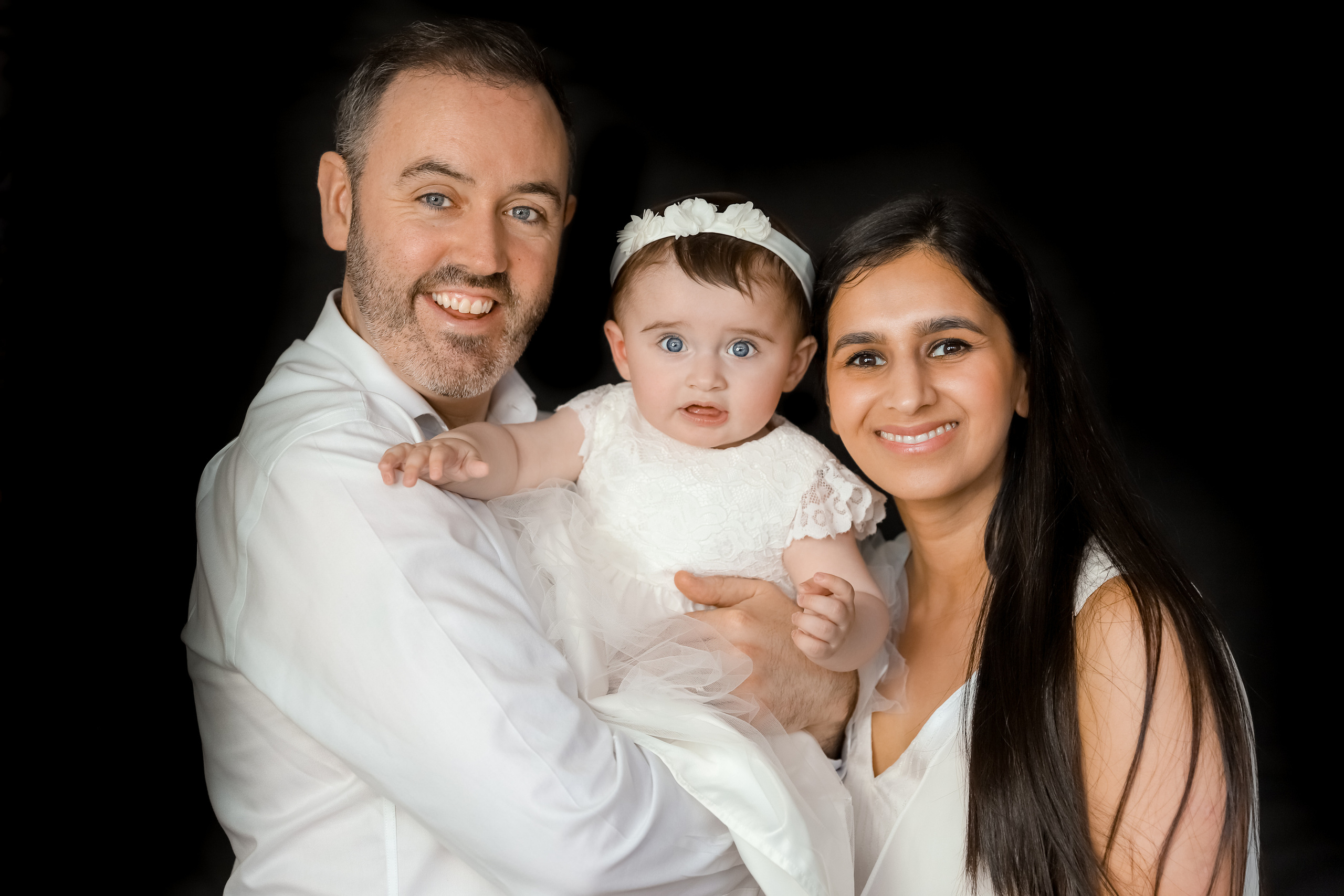 Black background. Family & children’s photographer in Herts & West London Iryna Blair