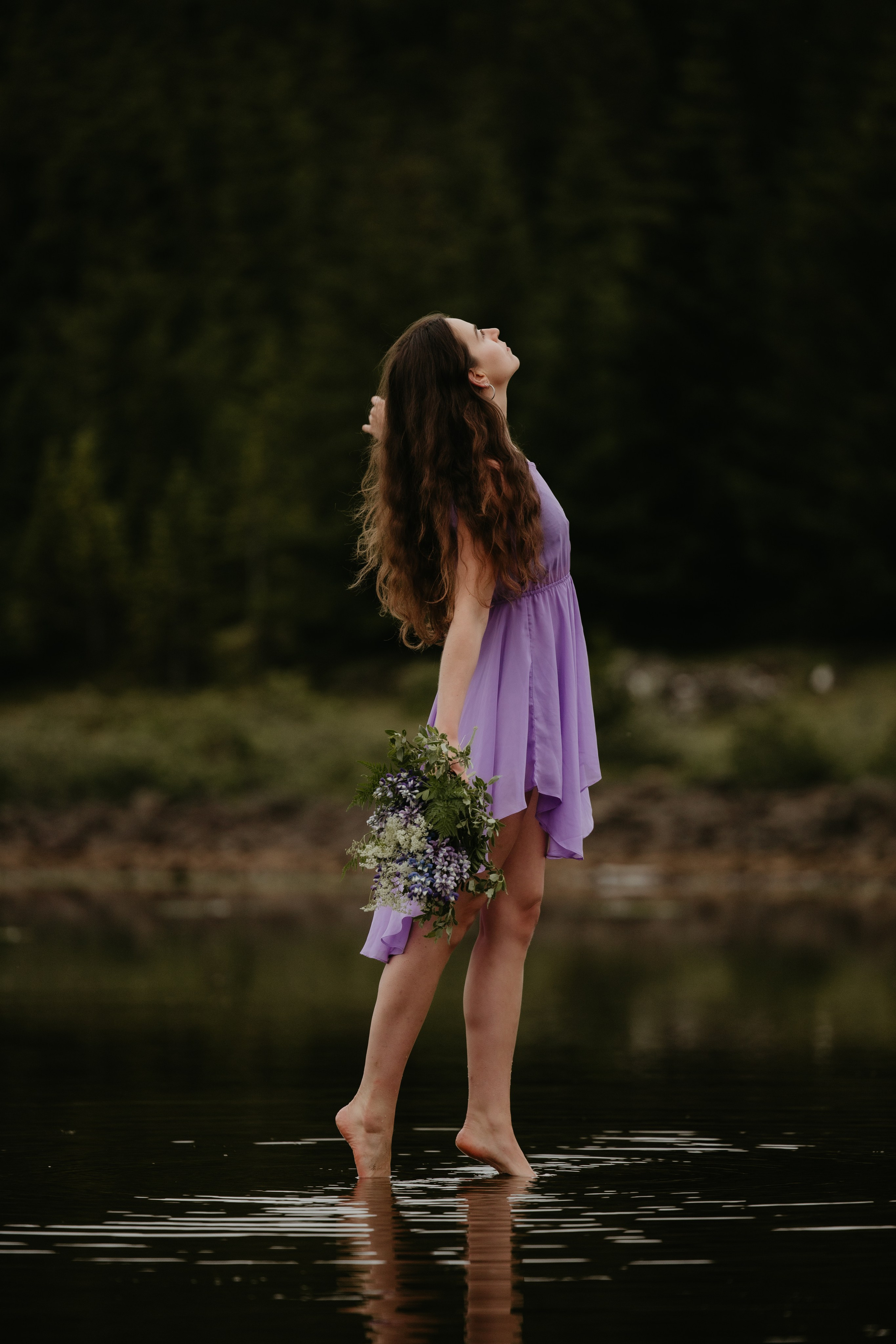 Wind in her hair—dreamy feminine portrait in Iceland’s dramatic natural scenery.