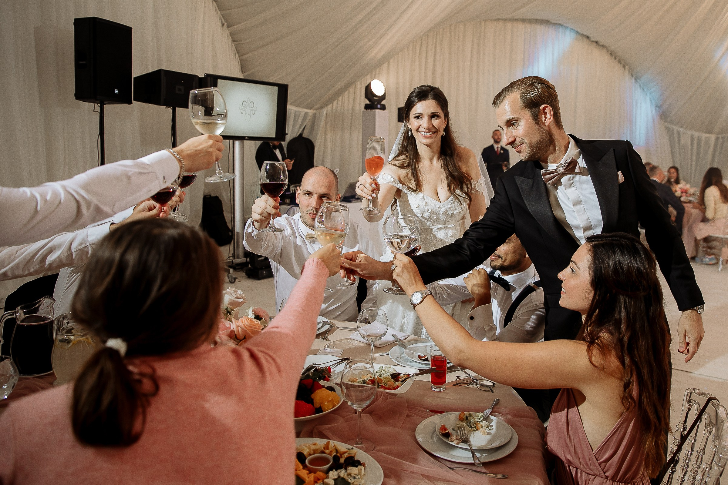 Guests celebrating reception, by Bude, Cornwall reportage photographer.