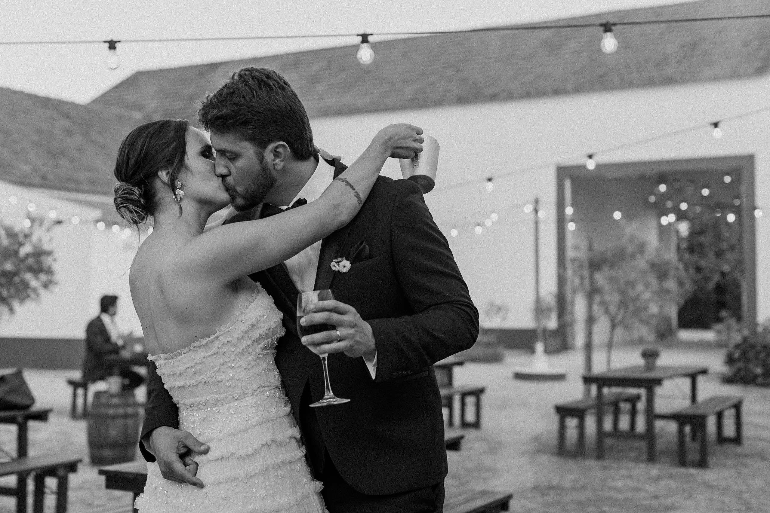 Black and white luxury portrait of man in tailored suit