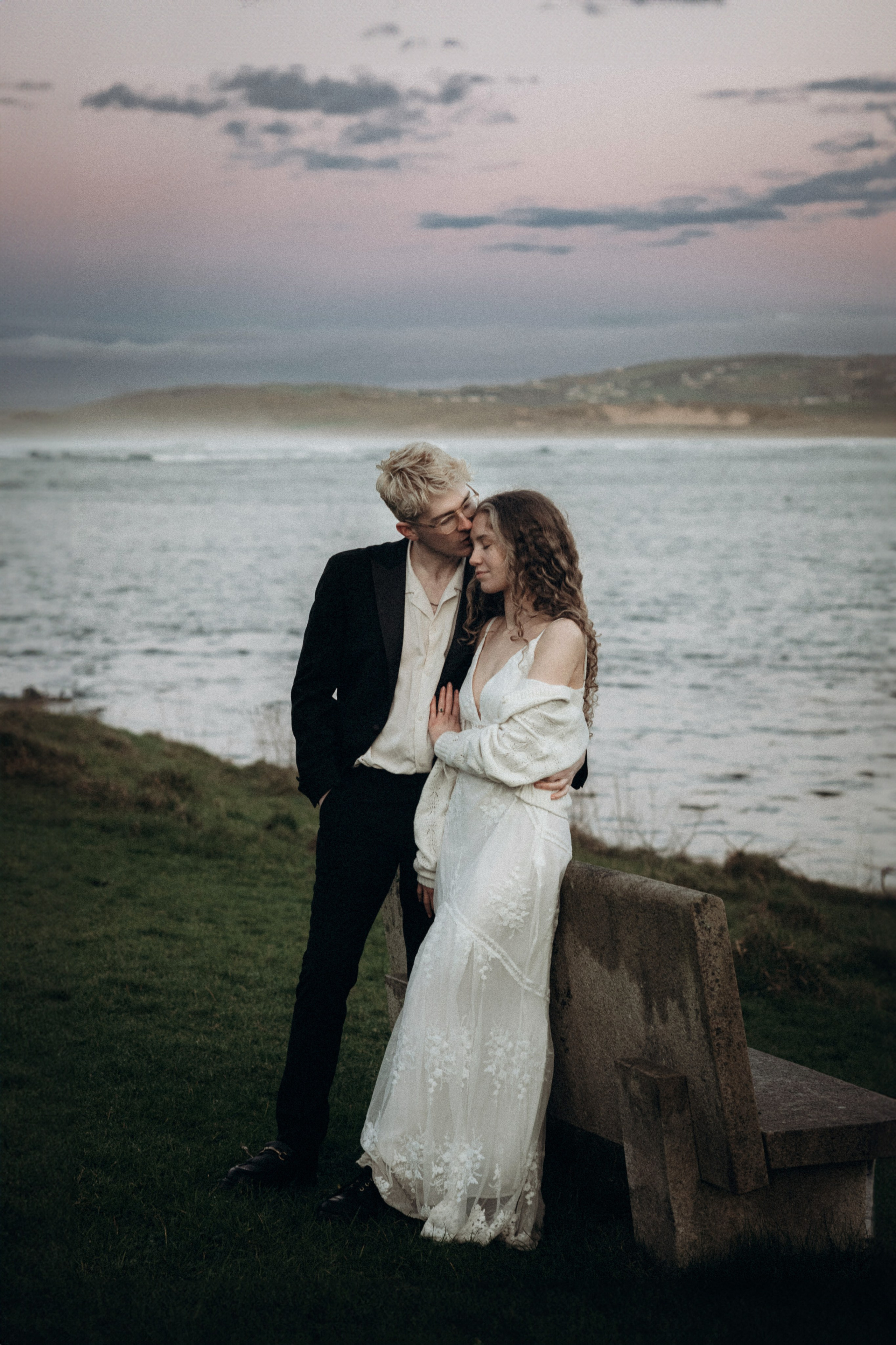 portrait of bride and groom by the lake