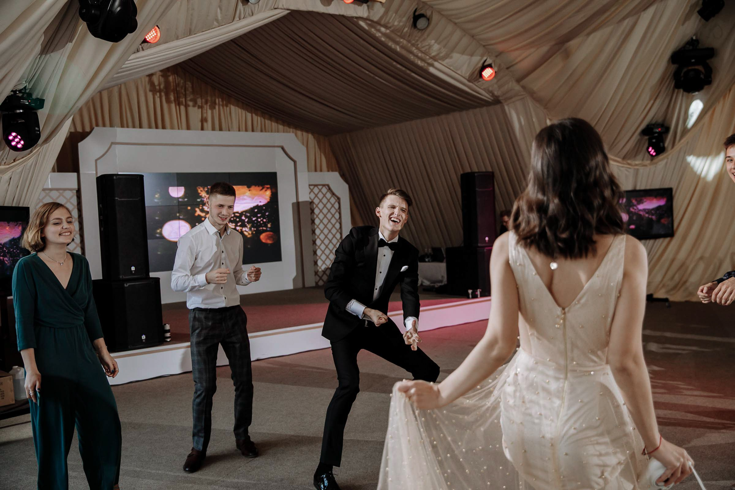 Bride on dance floor, by Tanya Bodgan, Bude, Cornwall wedding photography.