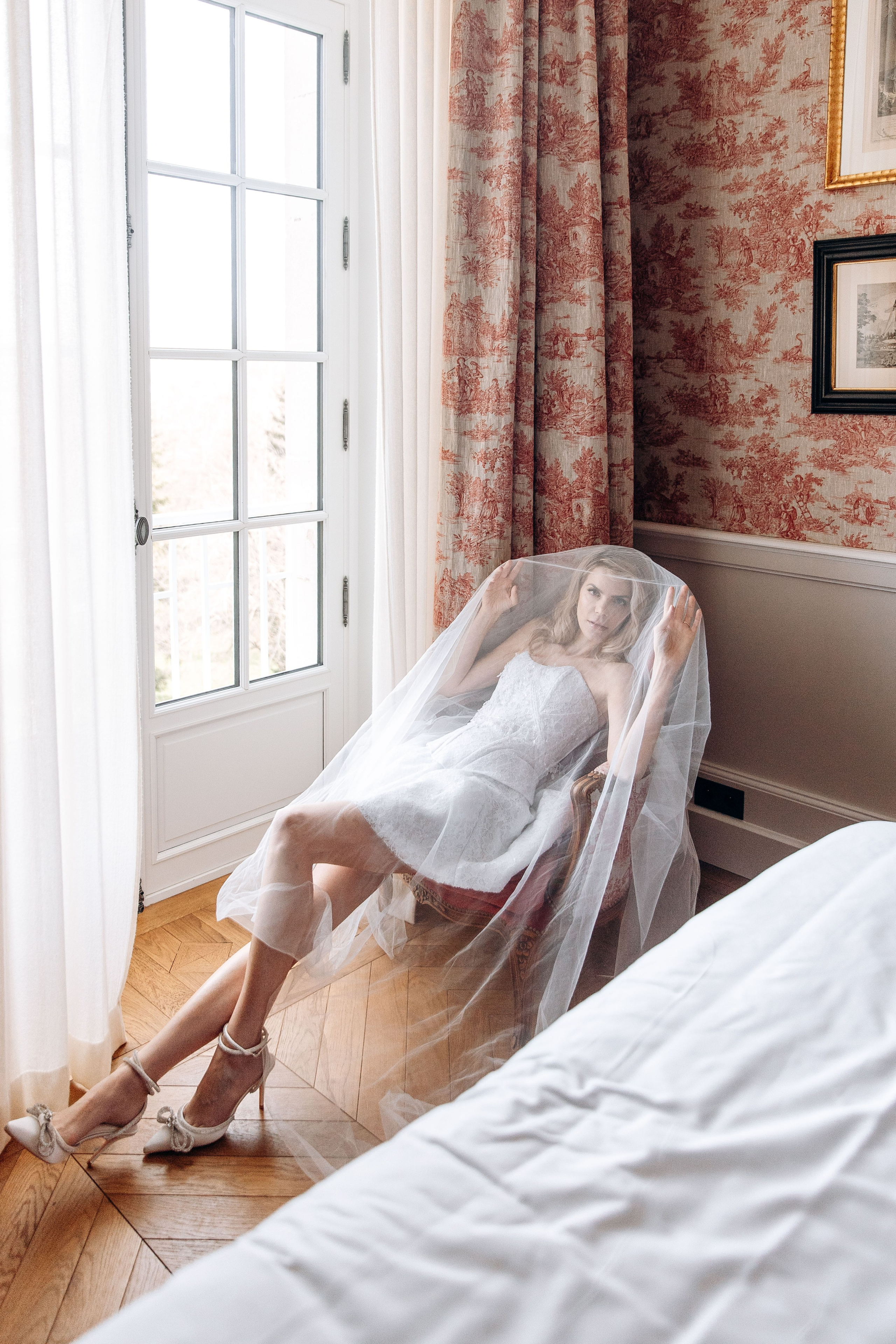 Elegant bridal accessories, including veil and jewelry, styled for a destination wedding in France.
