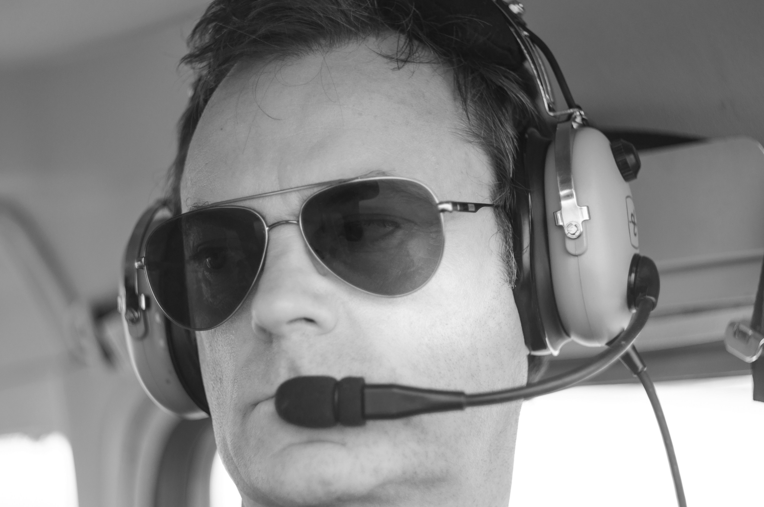 A photoshoot of a pilot and planes. Éclat Photos. Exclusive portrait photography service