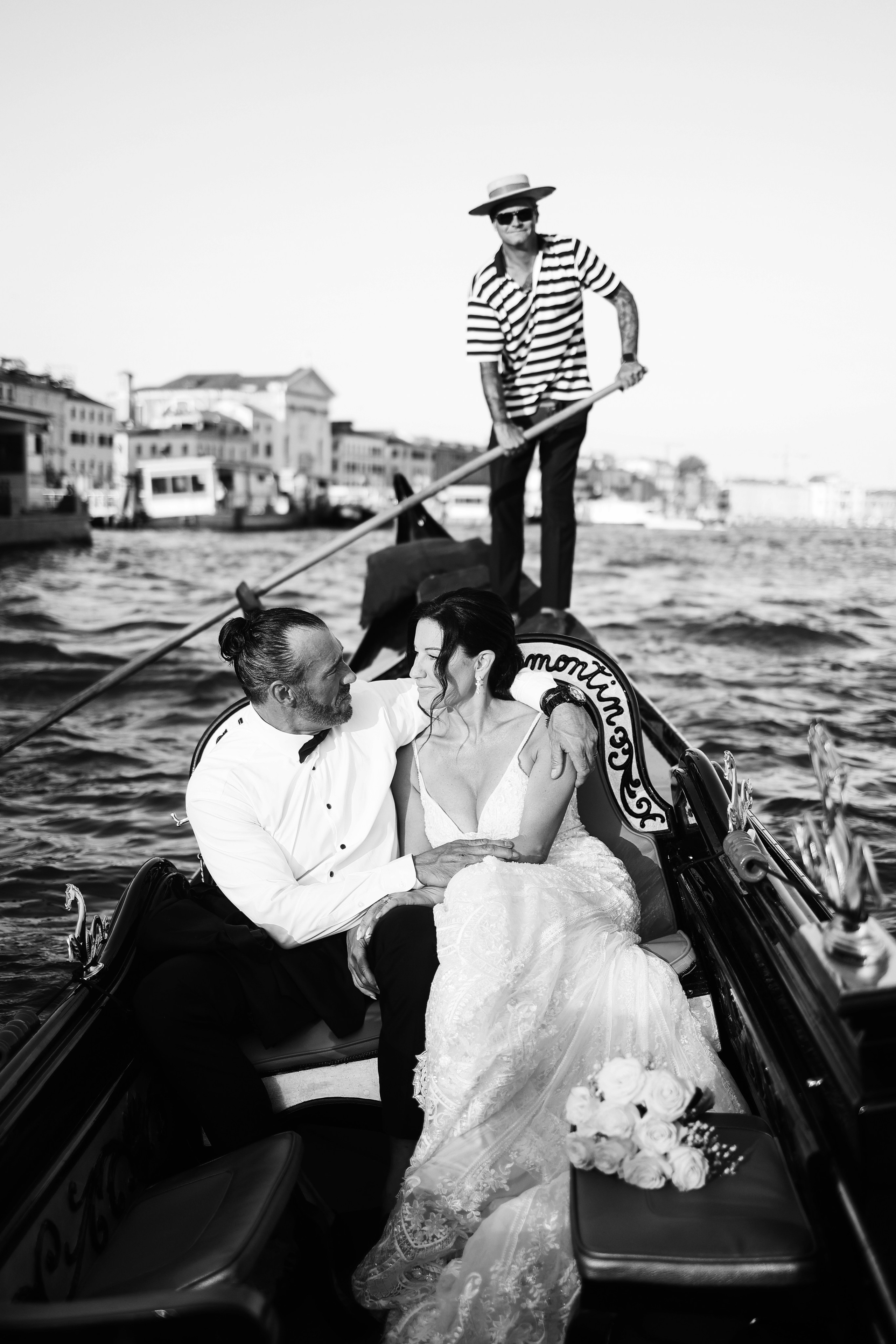 Bride and groom on the gondola ride 