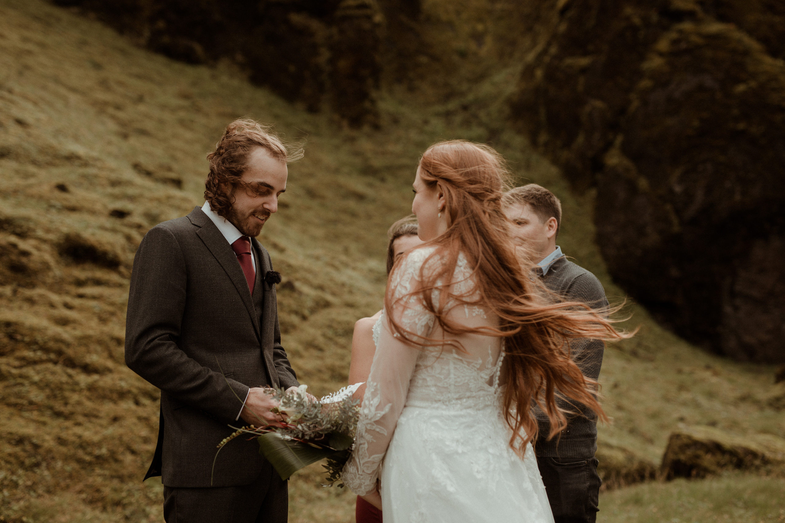 Ceremony at secret waterfall Iceland. Iceland elopement photographer & videographer