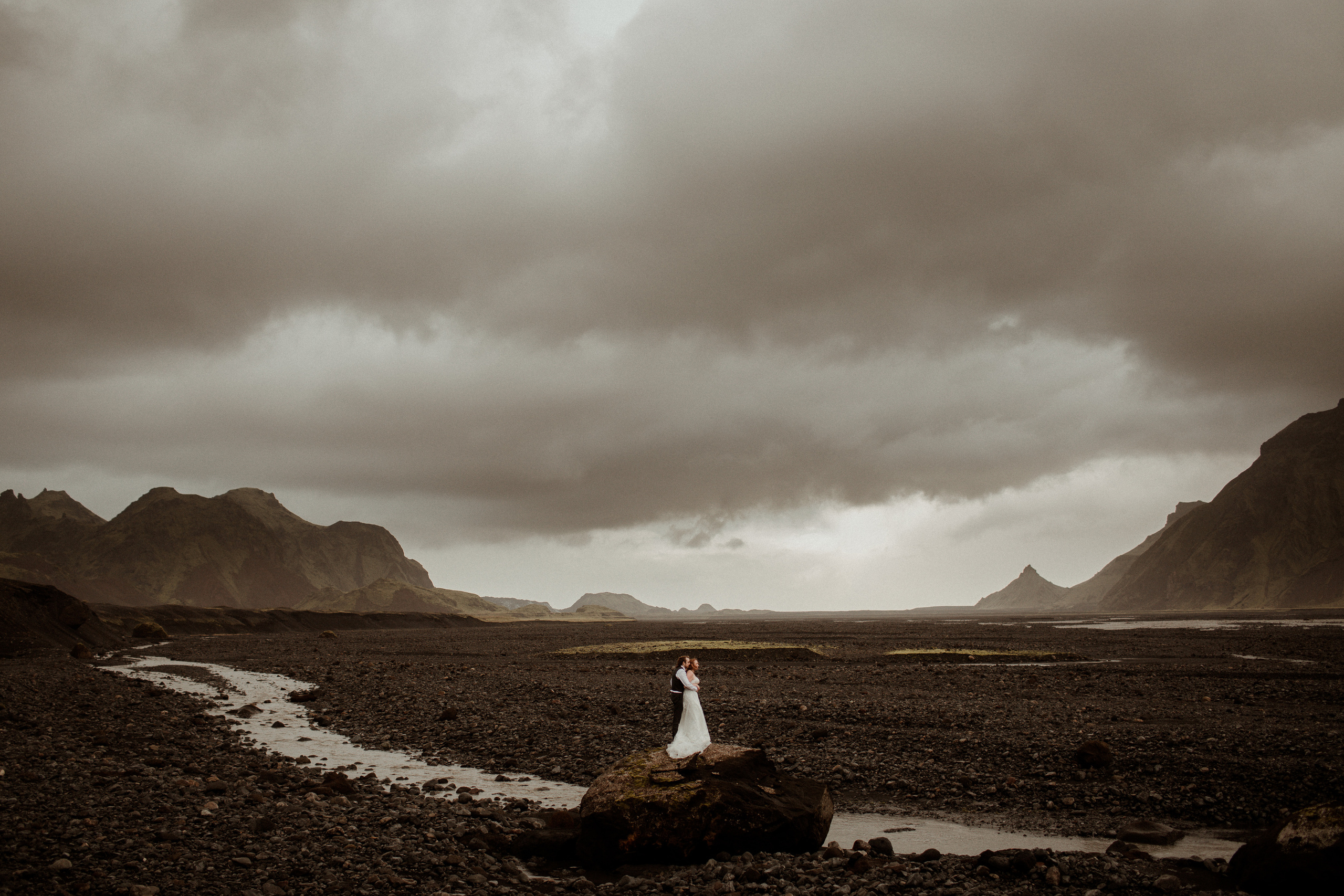 Ceremony at secret waterfall Iceland. Iceland elopement photographer & videographer