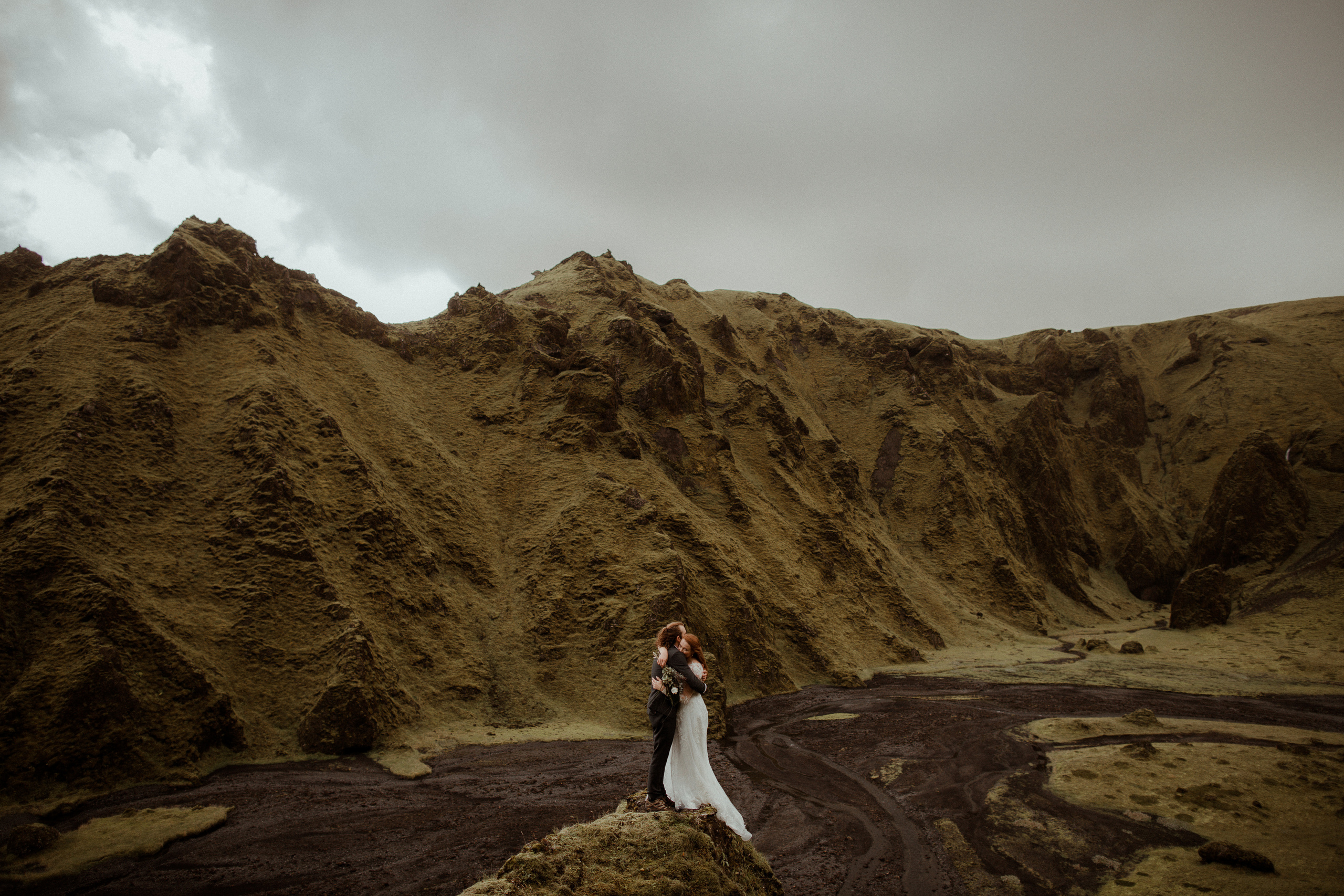 Ceremony at secret waterfall Iceland. Iceland elopement photographer & videographer
