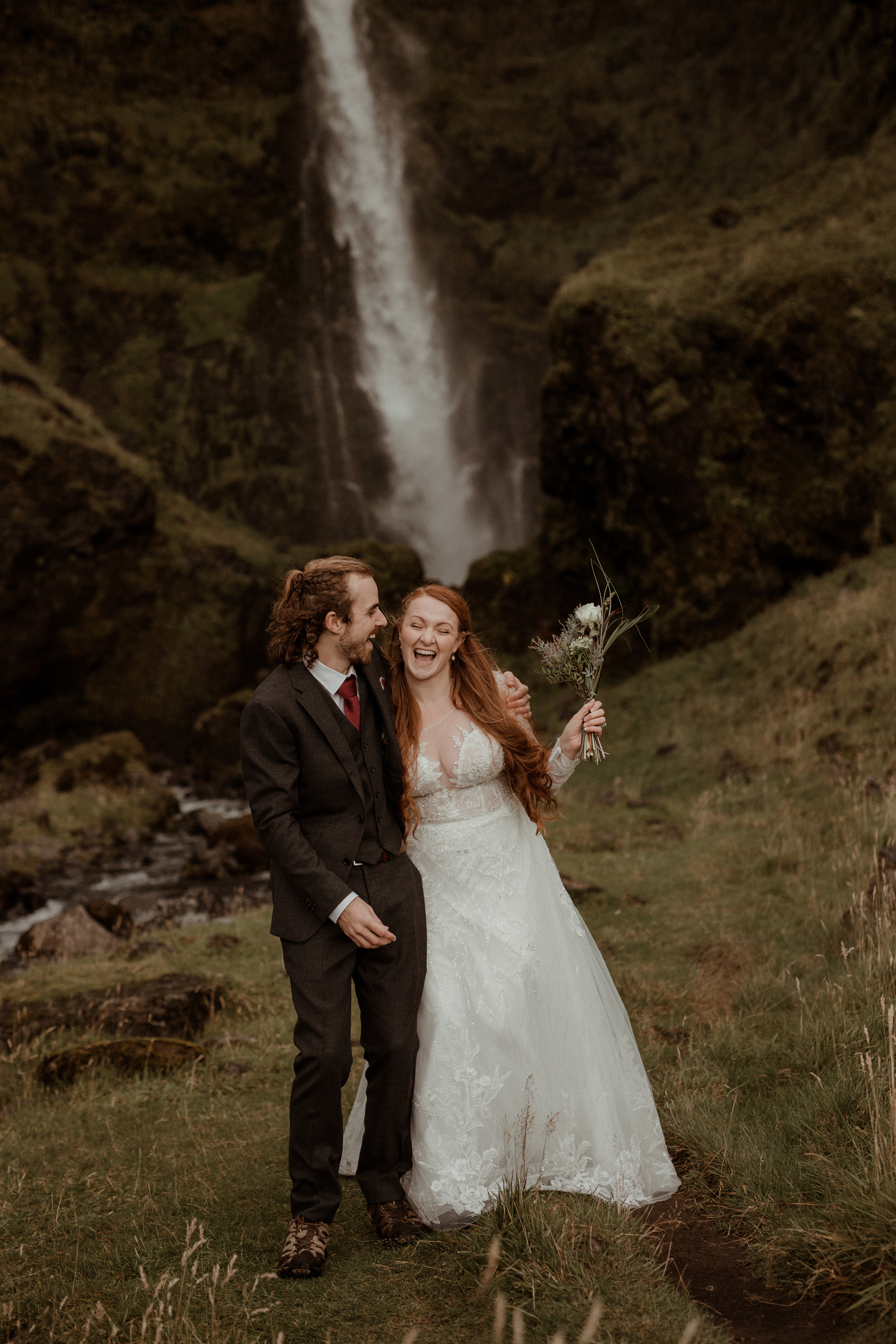 Ceremony at secret waterfall Iceland. Iceland elopement photographer & videographer