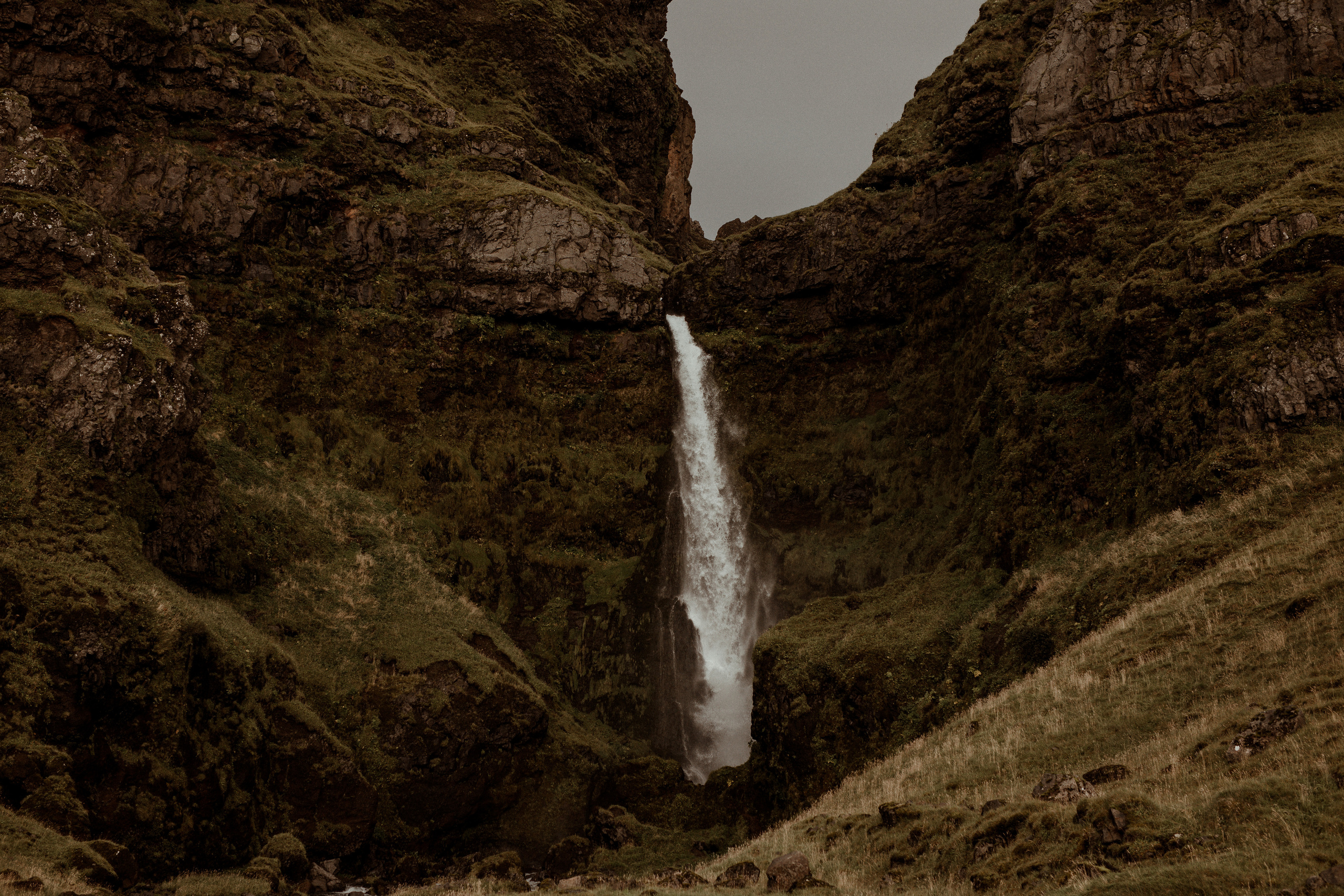 Ceremony at secret waterfall Iceland. Iceland elopement photographer & videographer