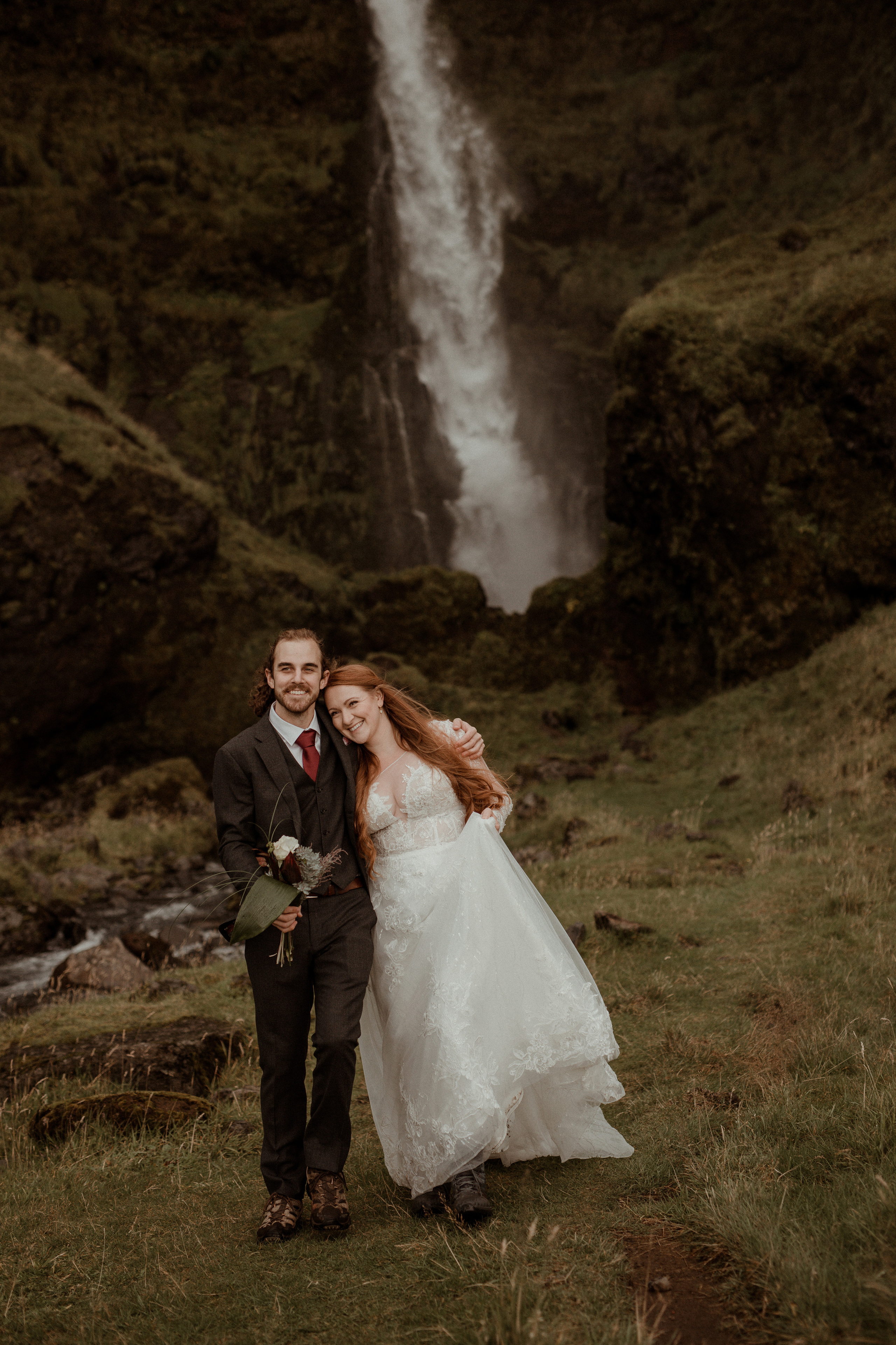 Ceremony at secret waterfall Iceland. Iceland elopement photographer & videographer