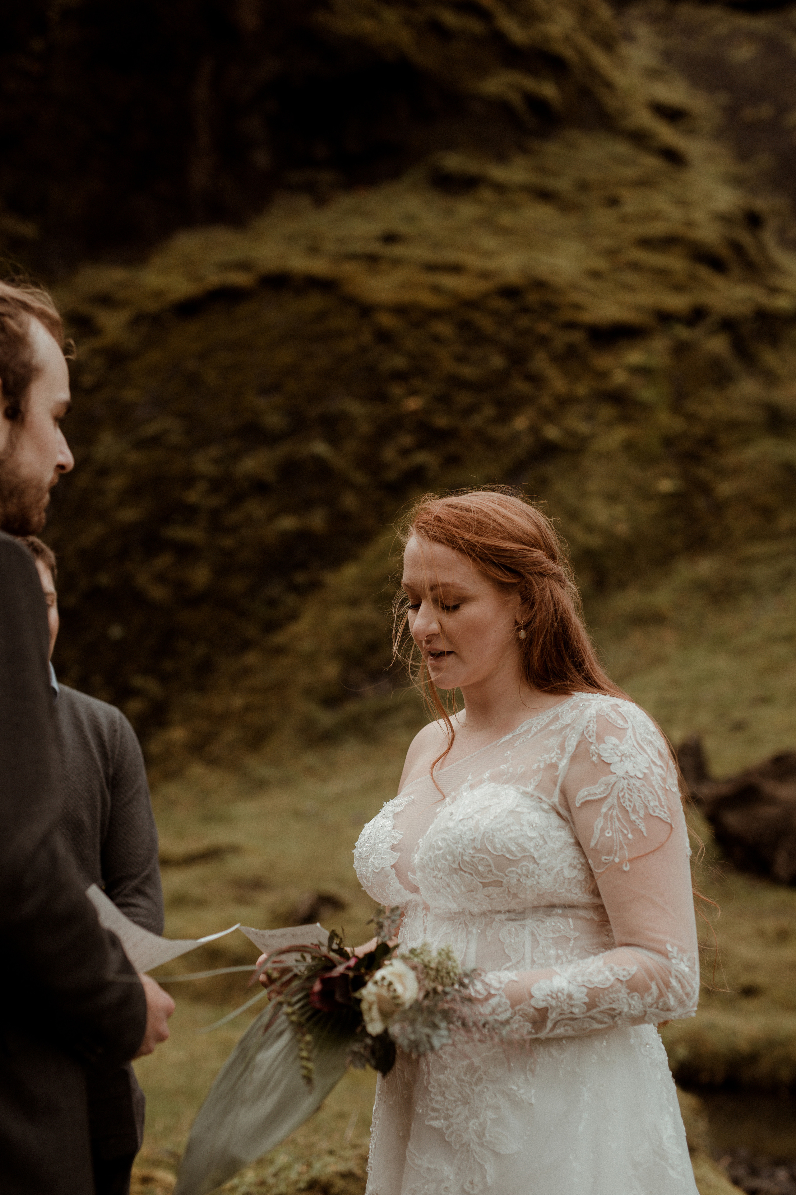 Ceremony at secret waterfall Iceland. Iceland elopement photographer & videographer