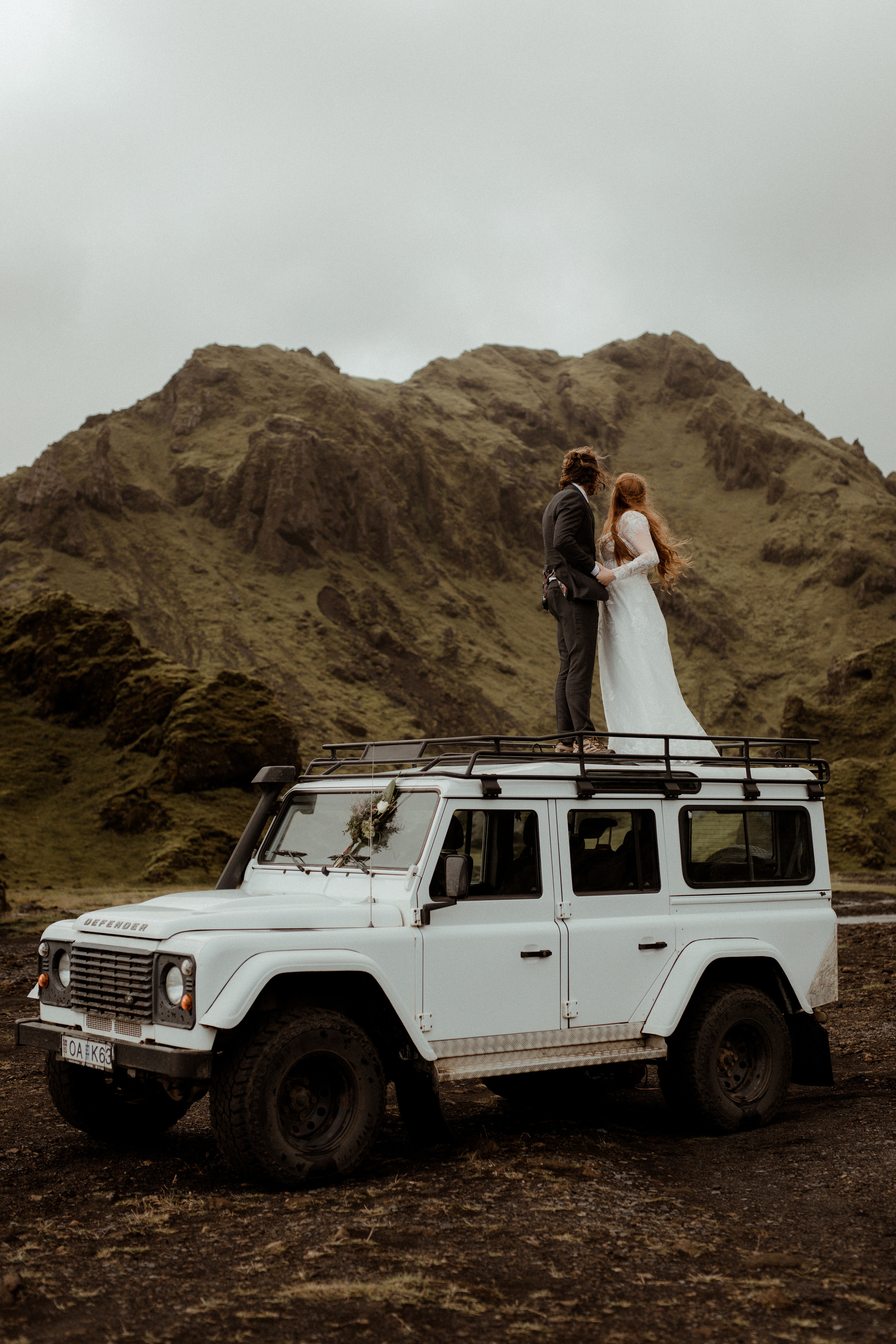 Ceremony at secret waterfall Iceland. Iceland elopement photographer & videographer