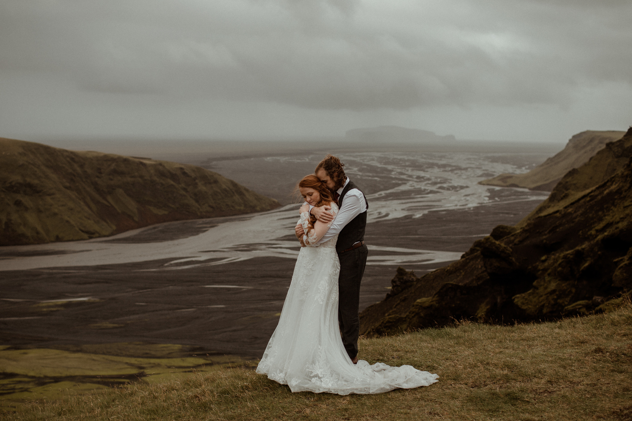 Ceremony at secret waterfall Iceland. Iceland elopement photographer & videographer