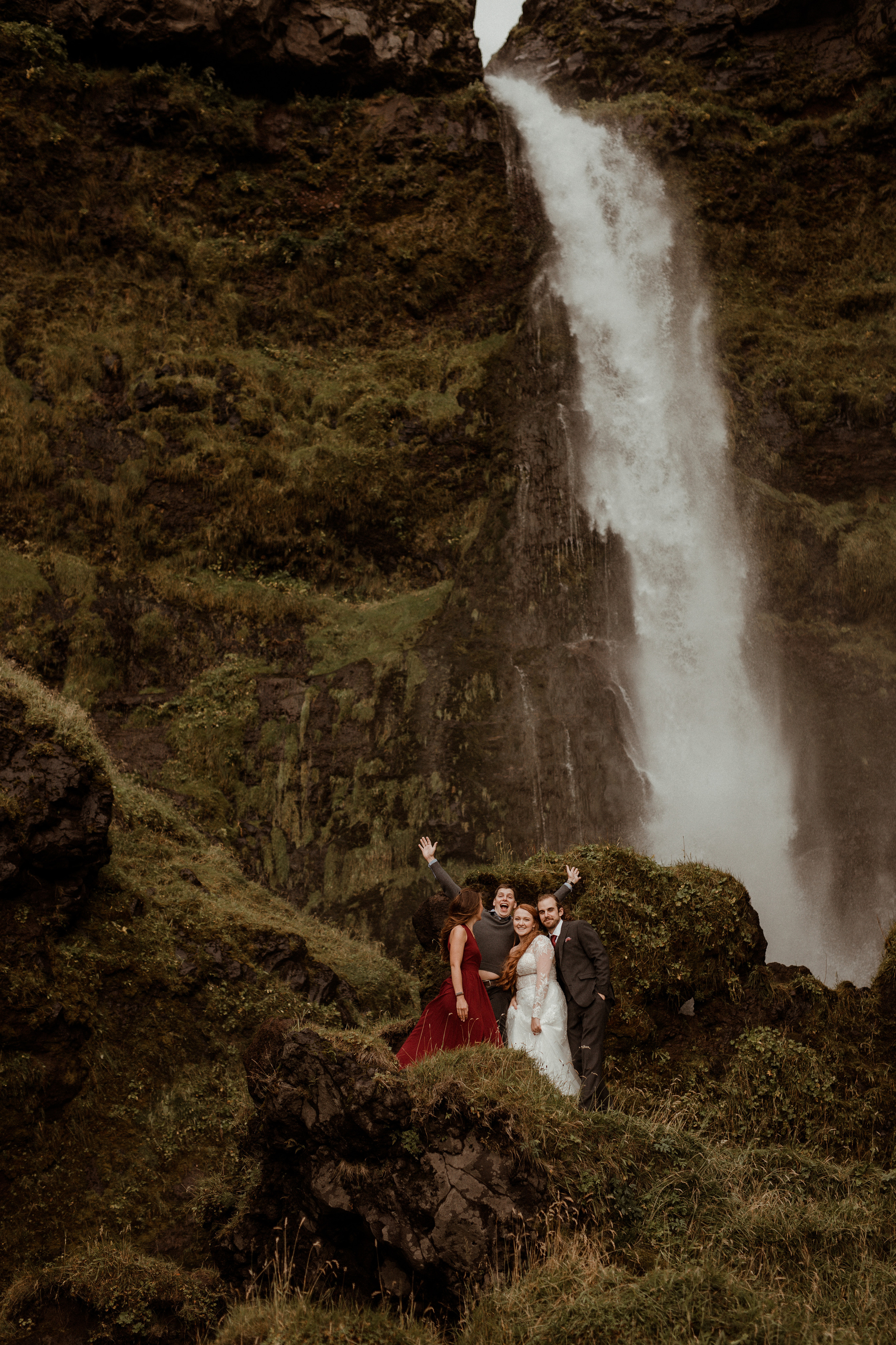 Ceremony at secret waterfall Iceland. Iceland elopement photographer & videographer