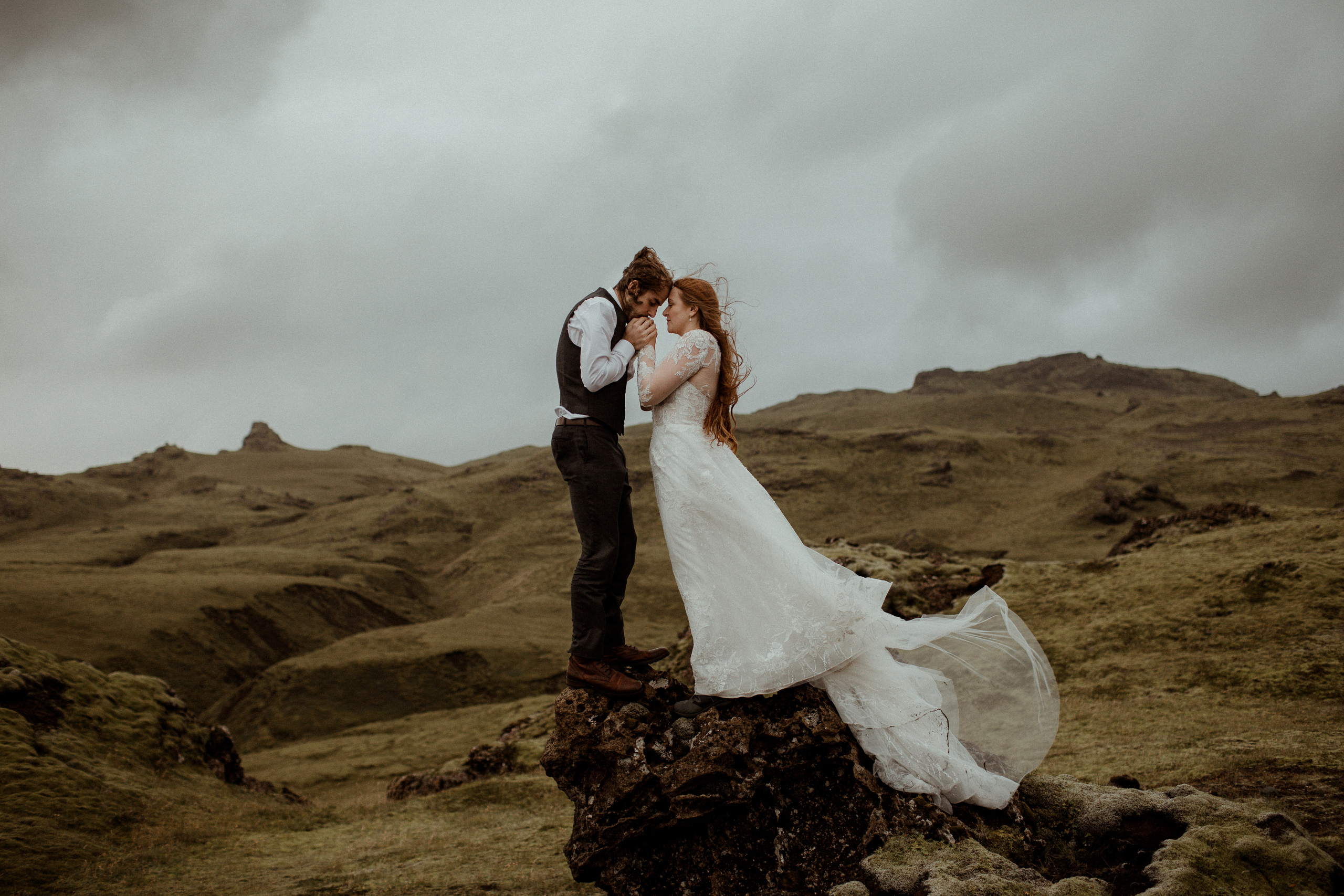 Ceremony at secret waterfall Iceland. Iceland elopement photographer & videographer