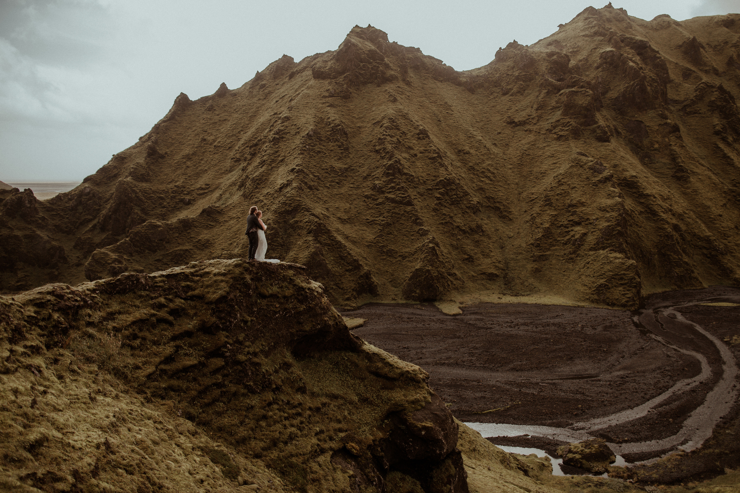 Ceremony at secret waterfall Iceland. Iceland elopement photographer & videographer