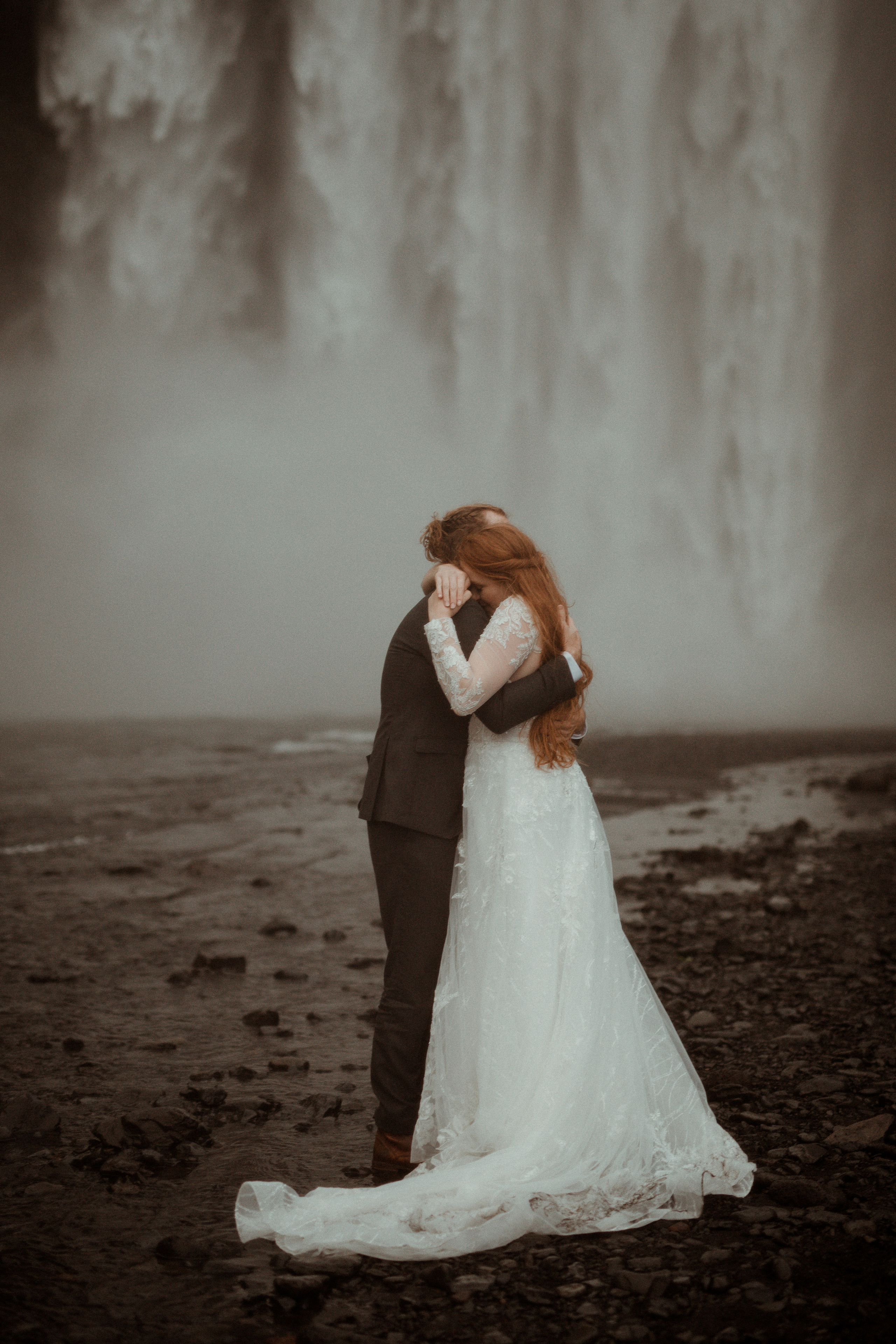 Ceremony at secret waterfall Iceland. Iceland elopement photographer & videographer