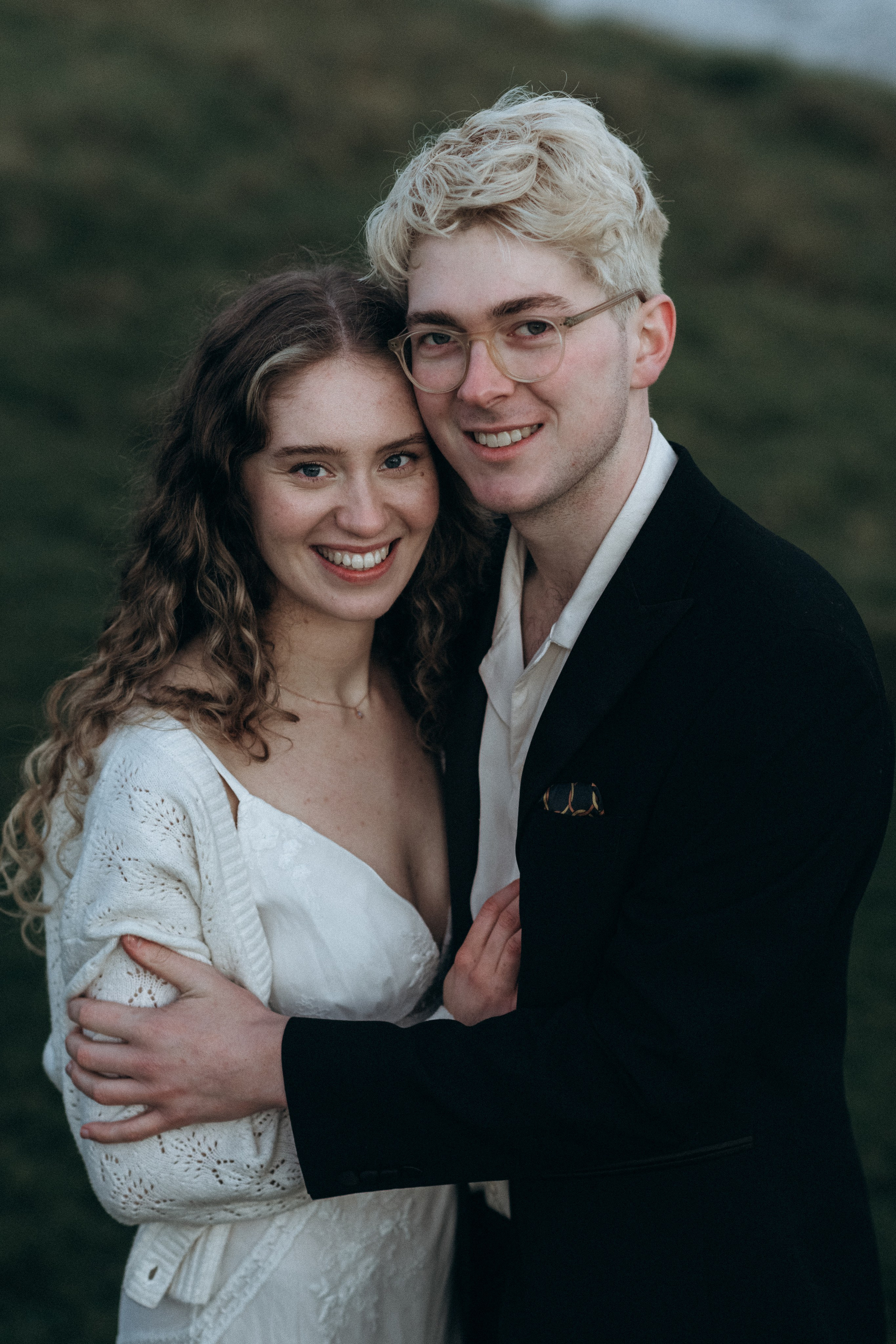 smiling bride and groom