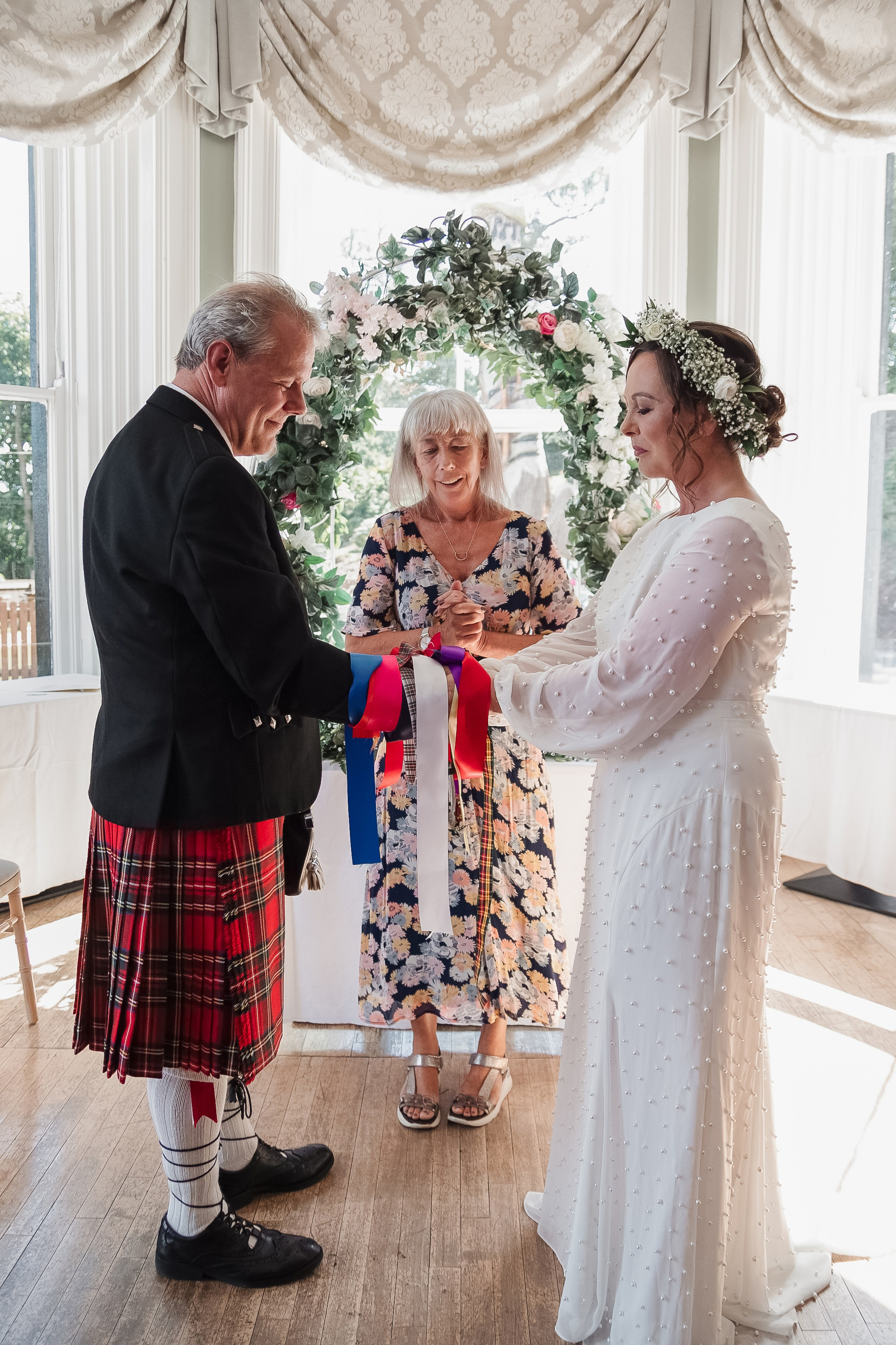 Candid moment during wedding ceremony in Waterford TheHeaven Hotel
