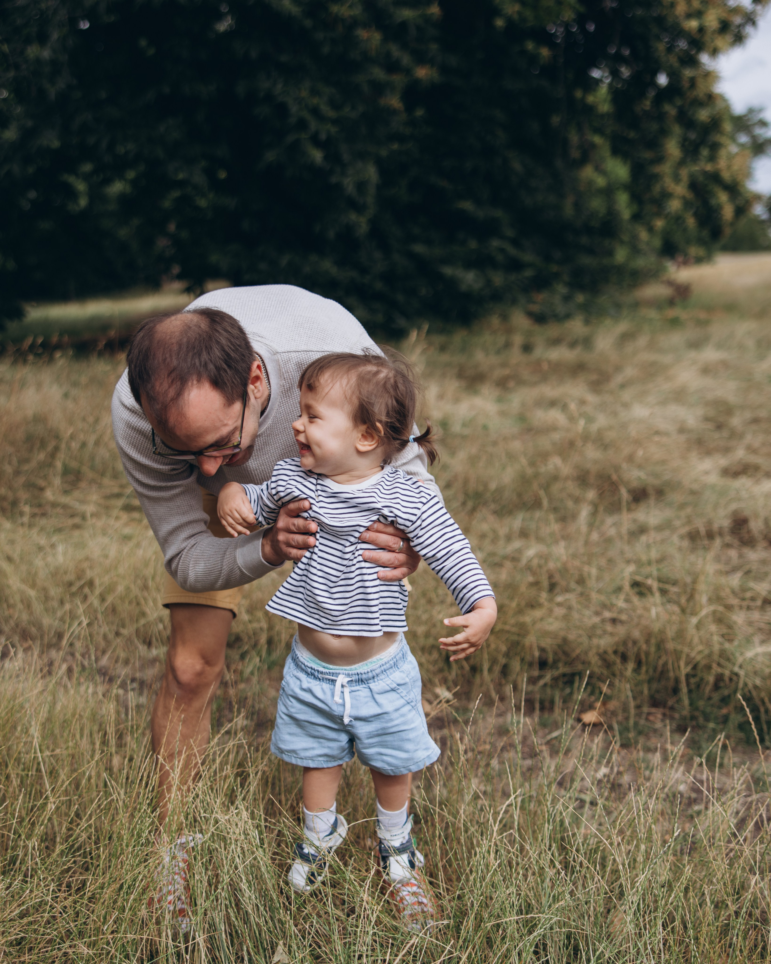 Milena with parents (Greenwich Park). Anastasia Klink, Photographer in London