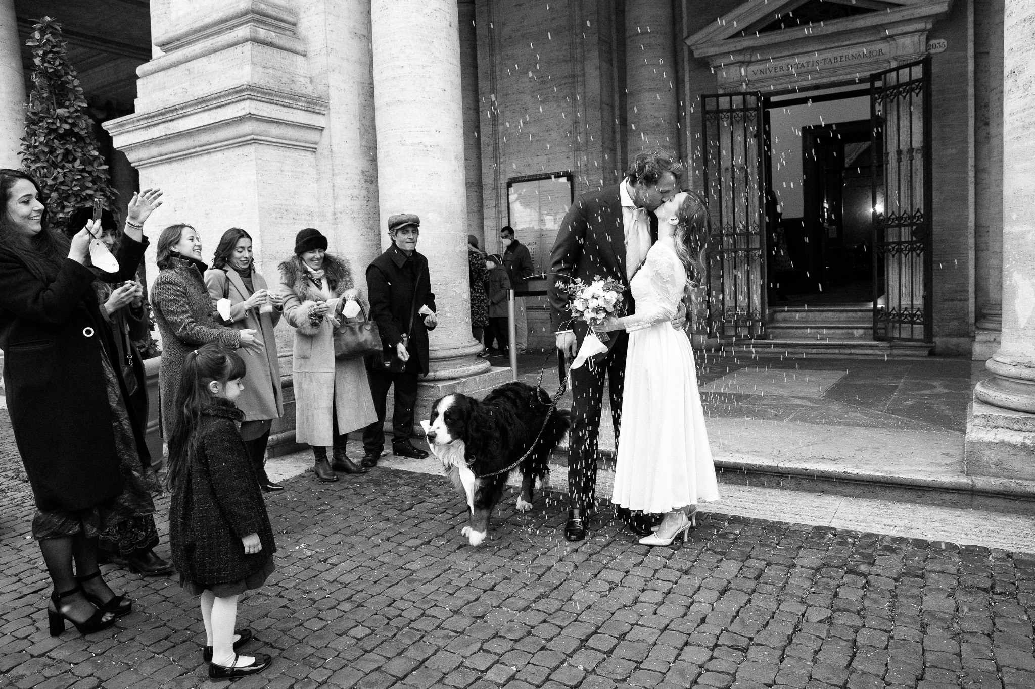 Newly weds exiting the historic Sala Rossa at Campidoglio.