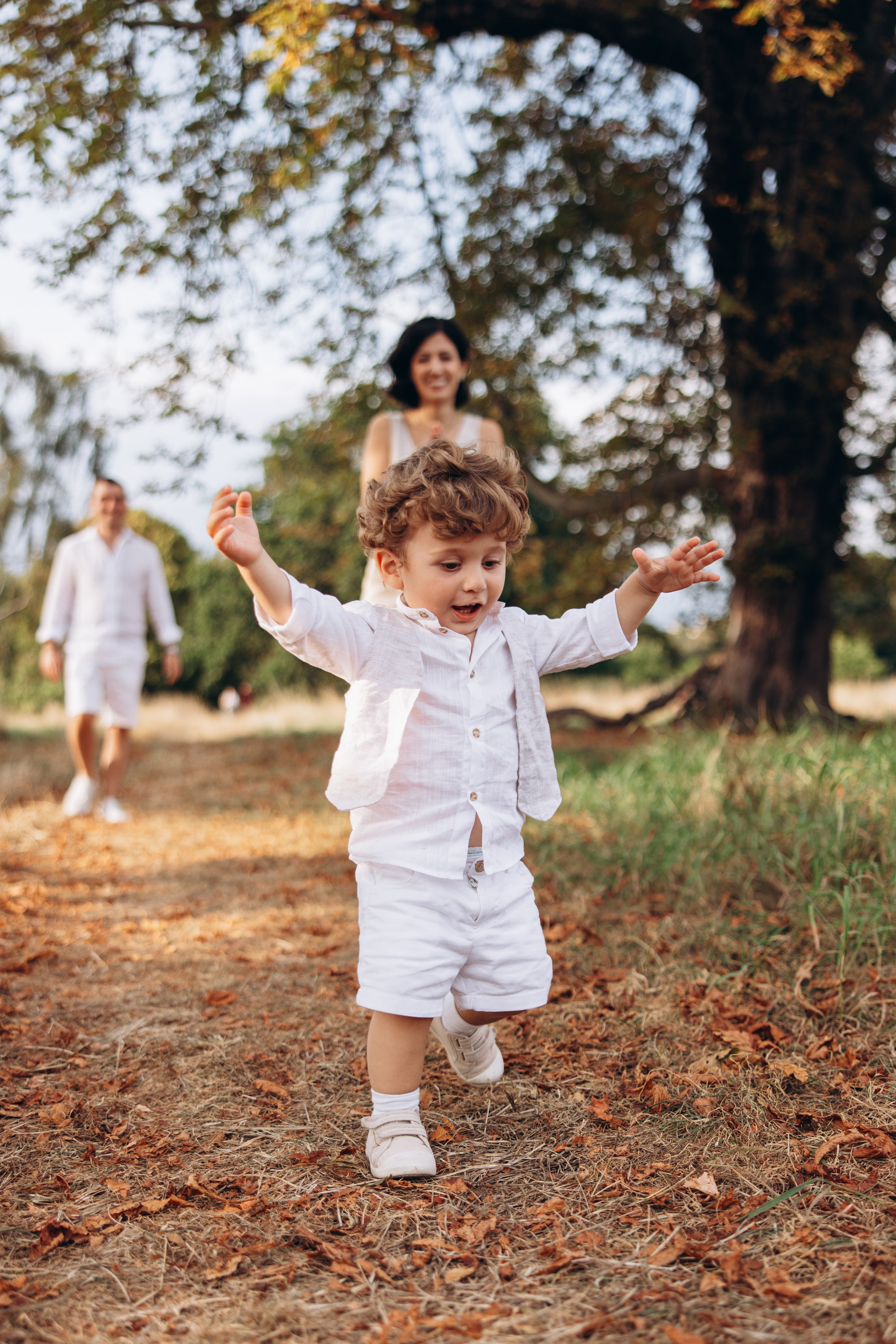 Valerik with parents (Hyde park). Anastasia Klink, Photographer in London