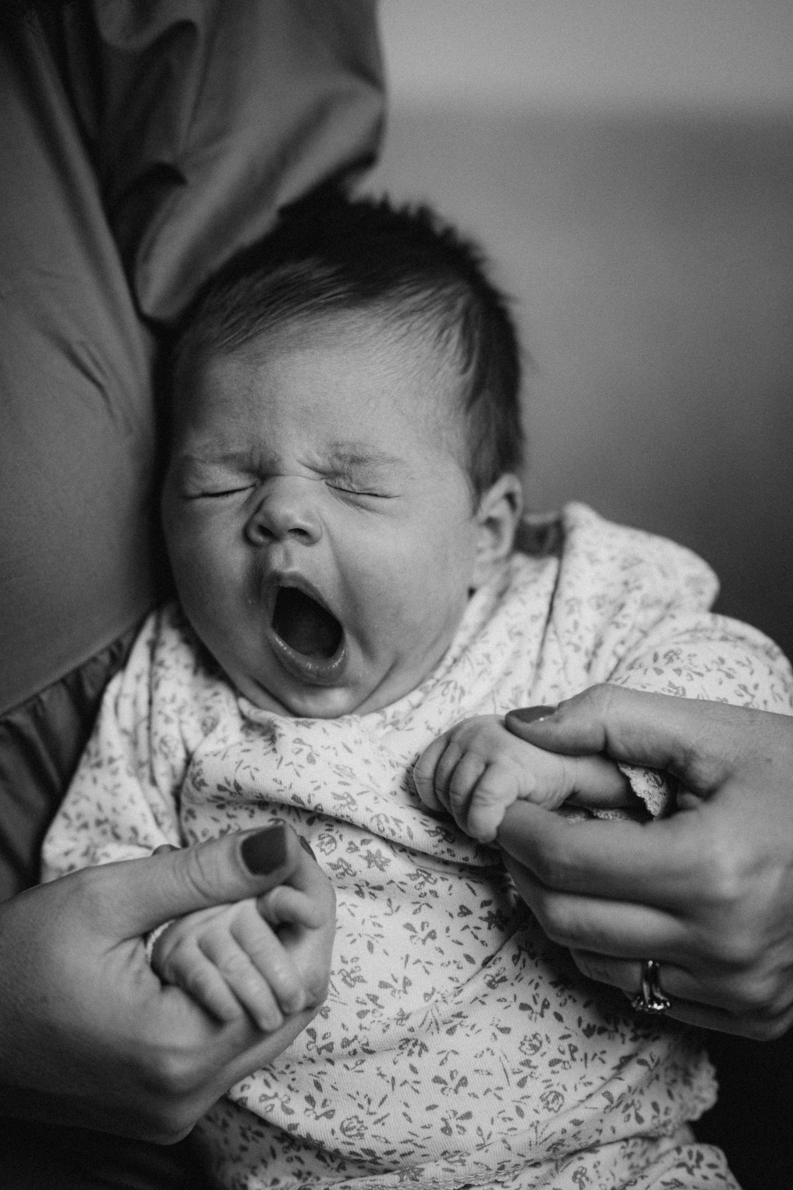 newborn baby yawning