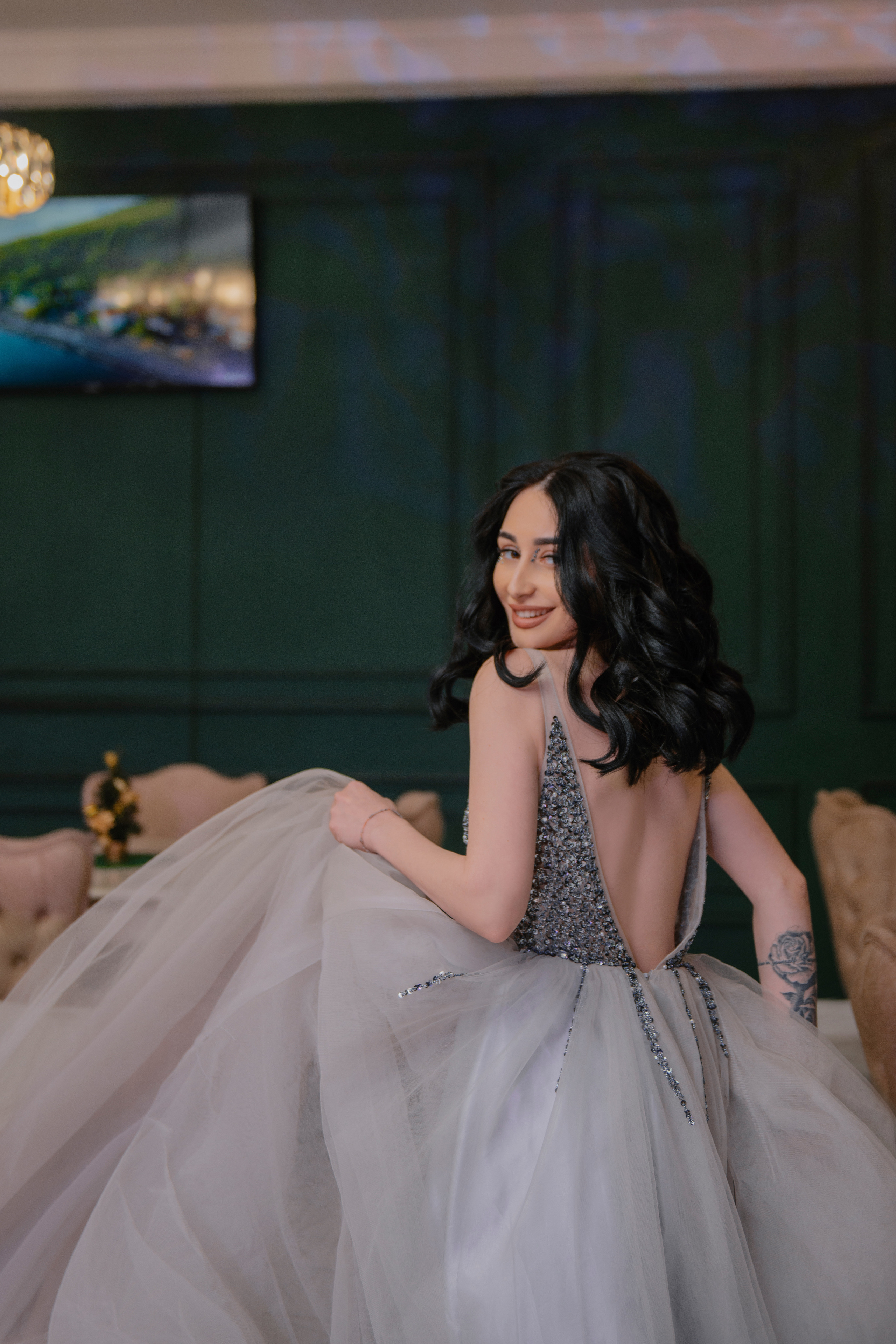 Portrait photoshoot in beautiful dresses in a restaurant in Prague. Professional photographer in Prague Anastasia Haritonova