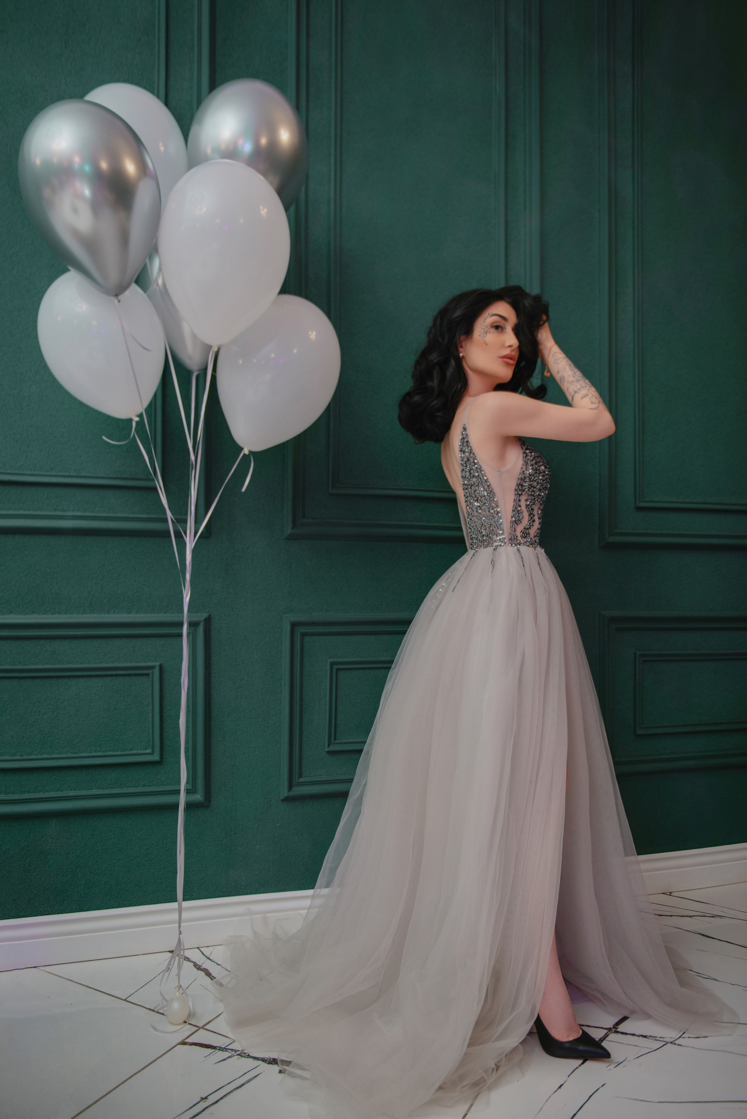 Portrait photoshoot in beautiful dresses in a restaurant in Prague. Professional photographer in Prague Anastasia Haritonova