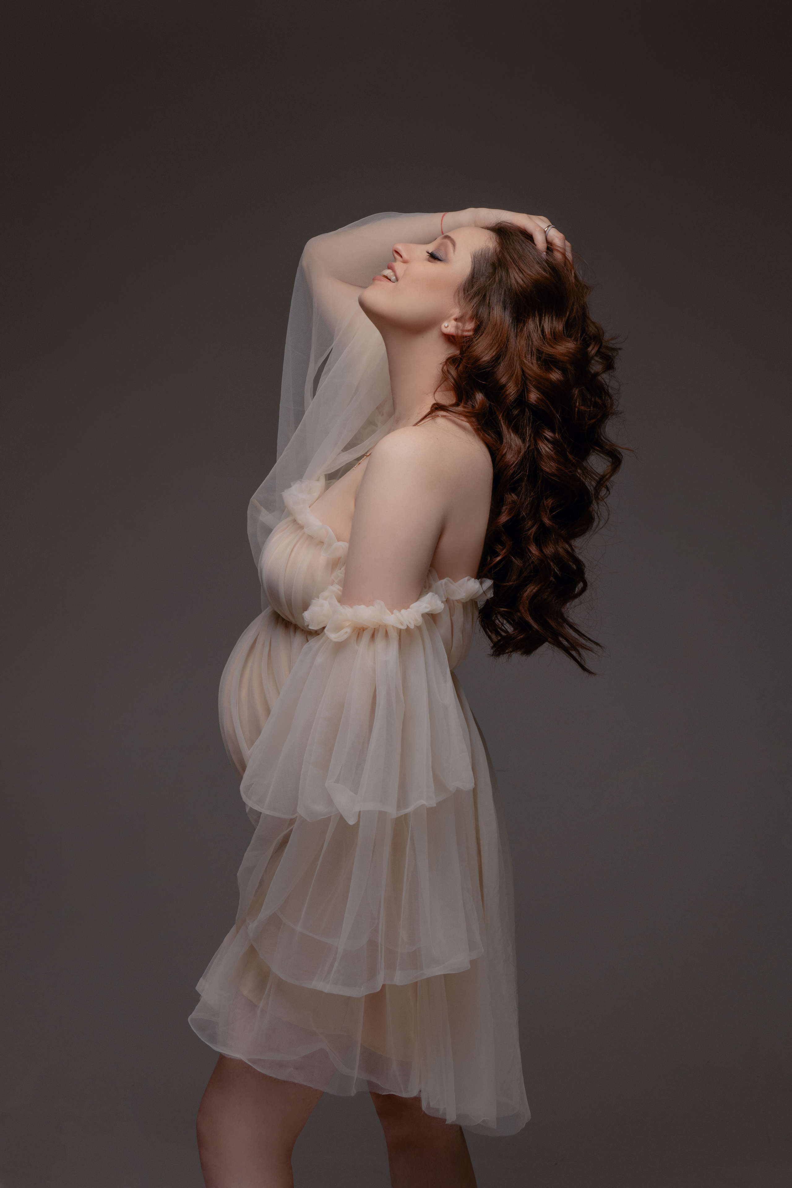 Pregnancy photoshoot in the studio in Prague and Czech Republic. Professional photographer in Prague Anastasia Haritonova
