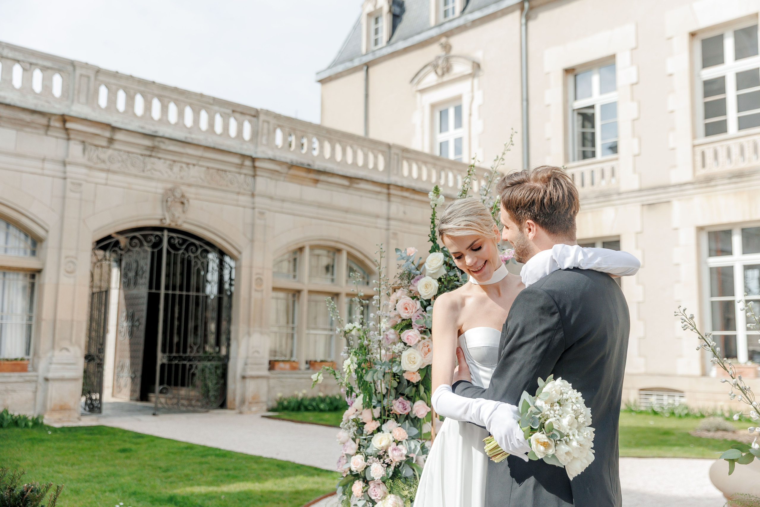 Beautifully decorated wedding reception table set up under fairy lights in Barcelona
