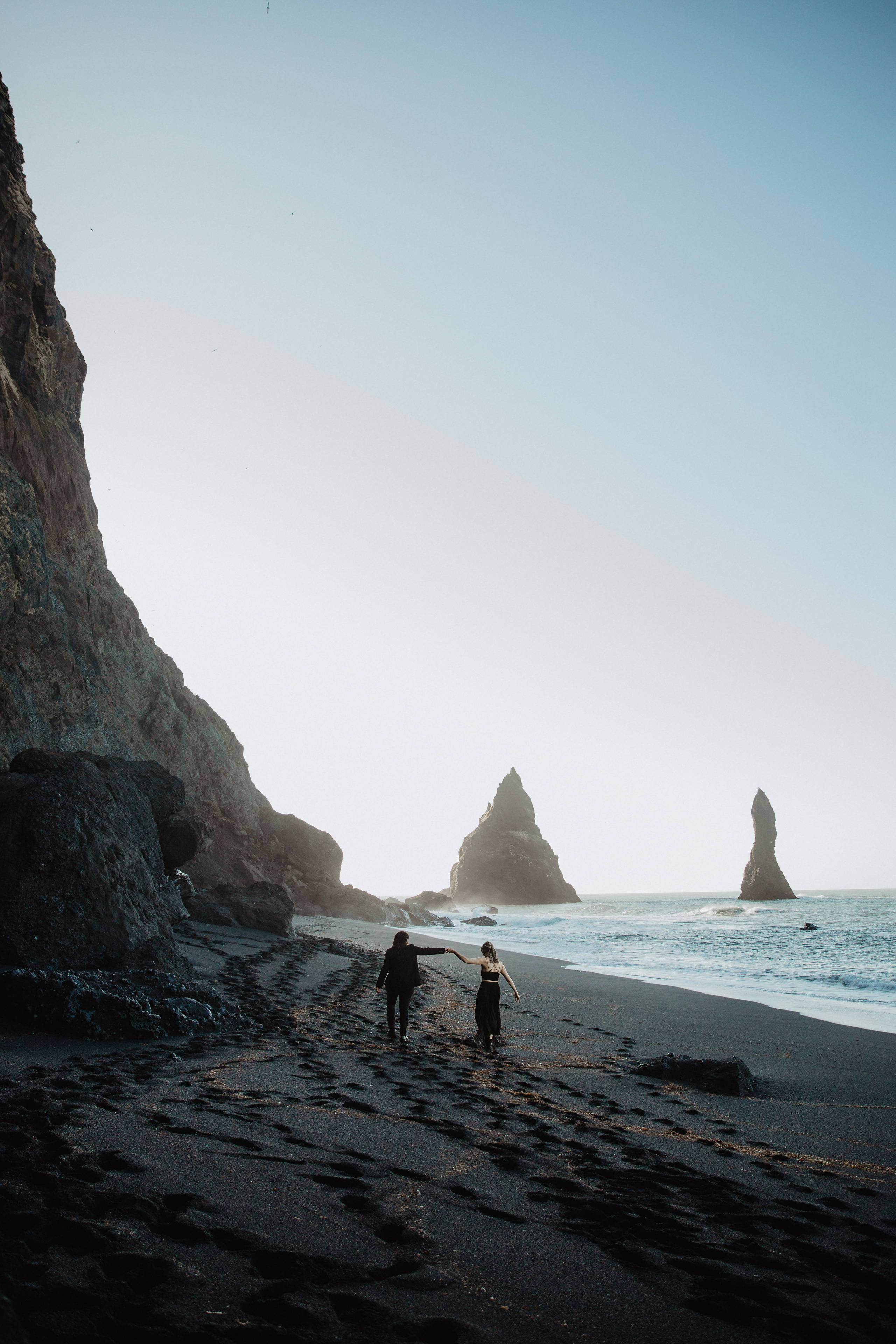 Sunrise elopement at black sand beach in Iceland. Iceland elopement photo and video | Nikolaichik Photo