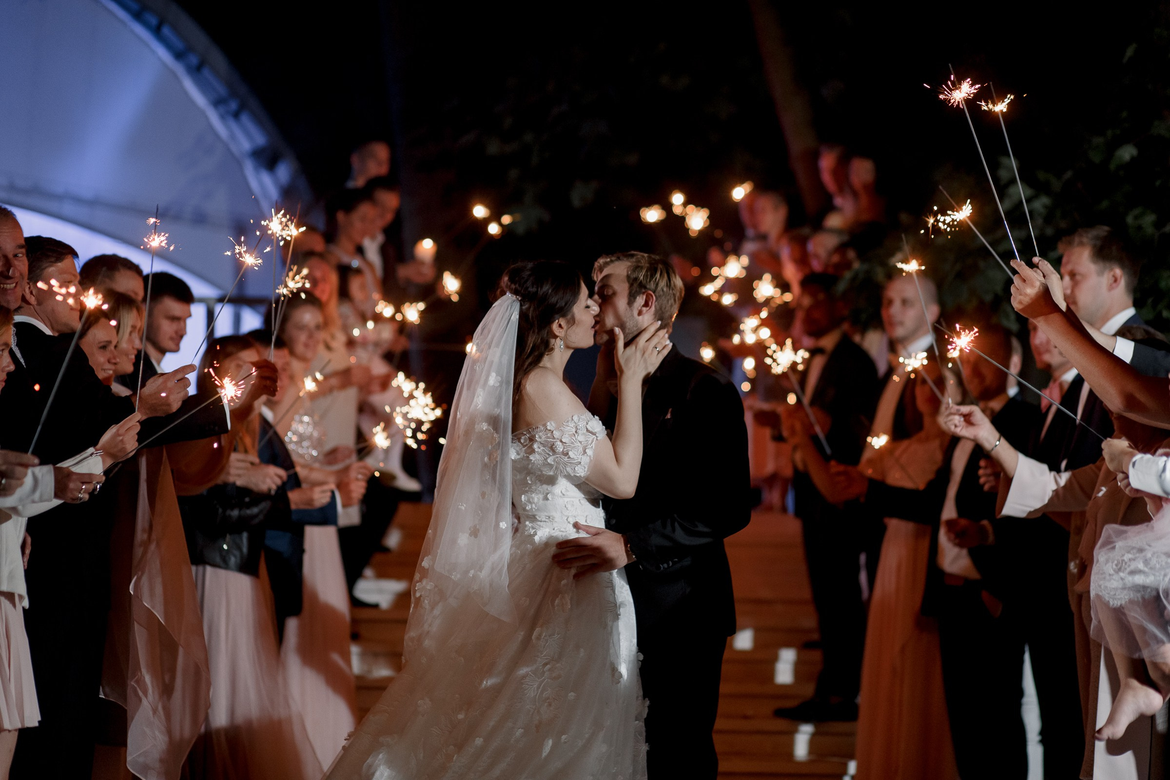 Couple’s sparkler exit, by Bude, Cornwall reportage photographer.