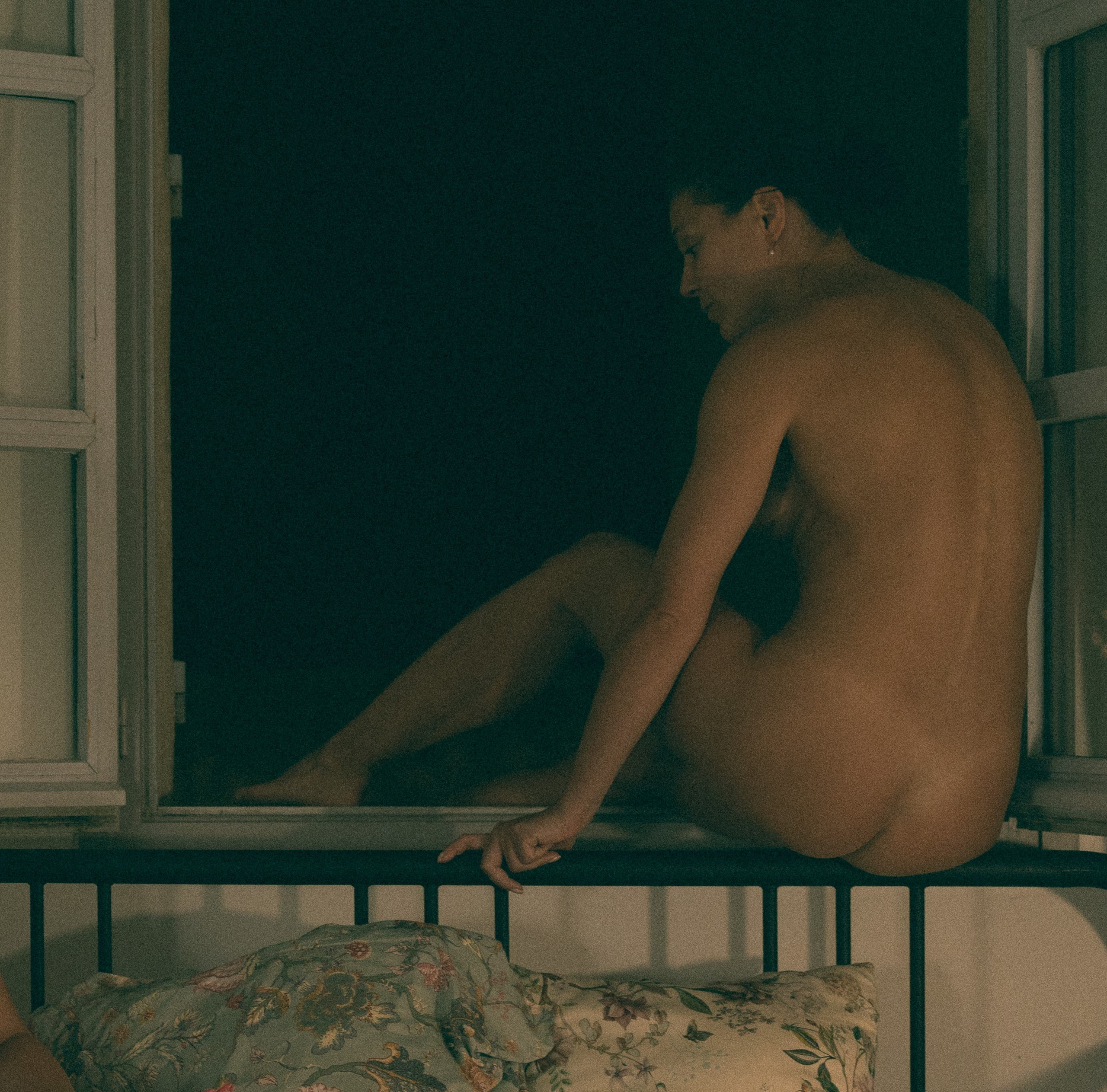 Nude photo in retro style mysterious setting France Provence city Avignon. Love stories, family and wedding photoshoots in France