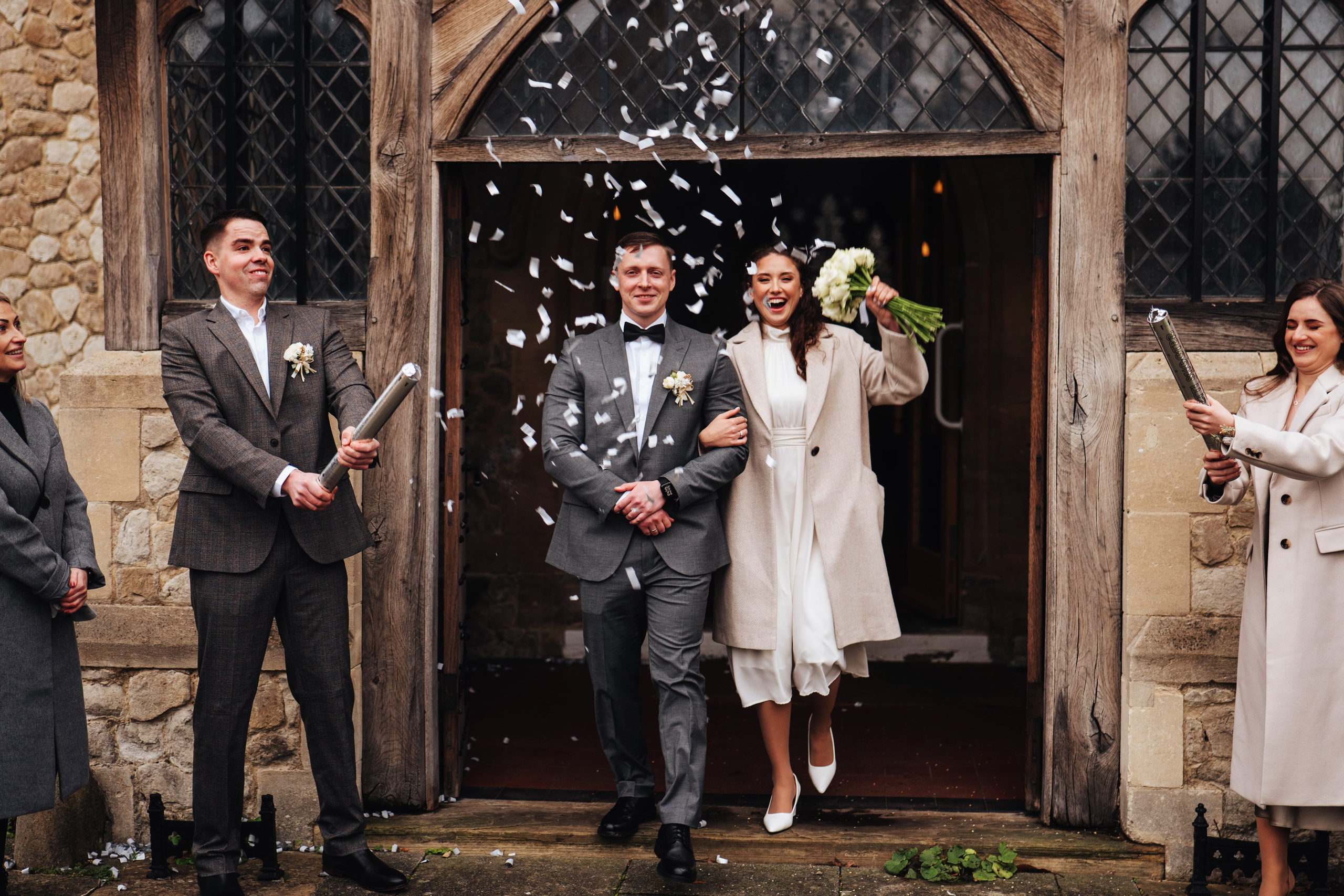 confetti at the exit from church after the wedding ceremony