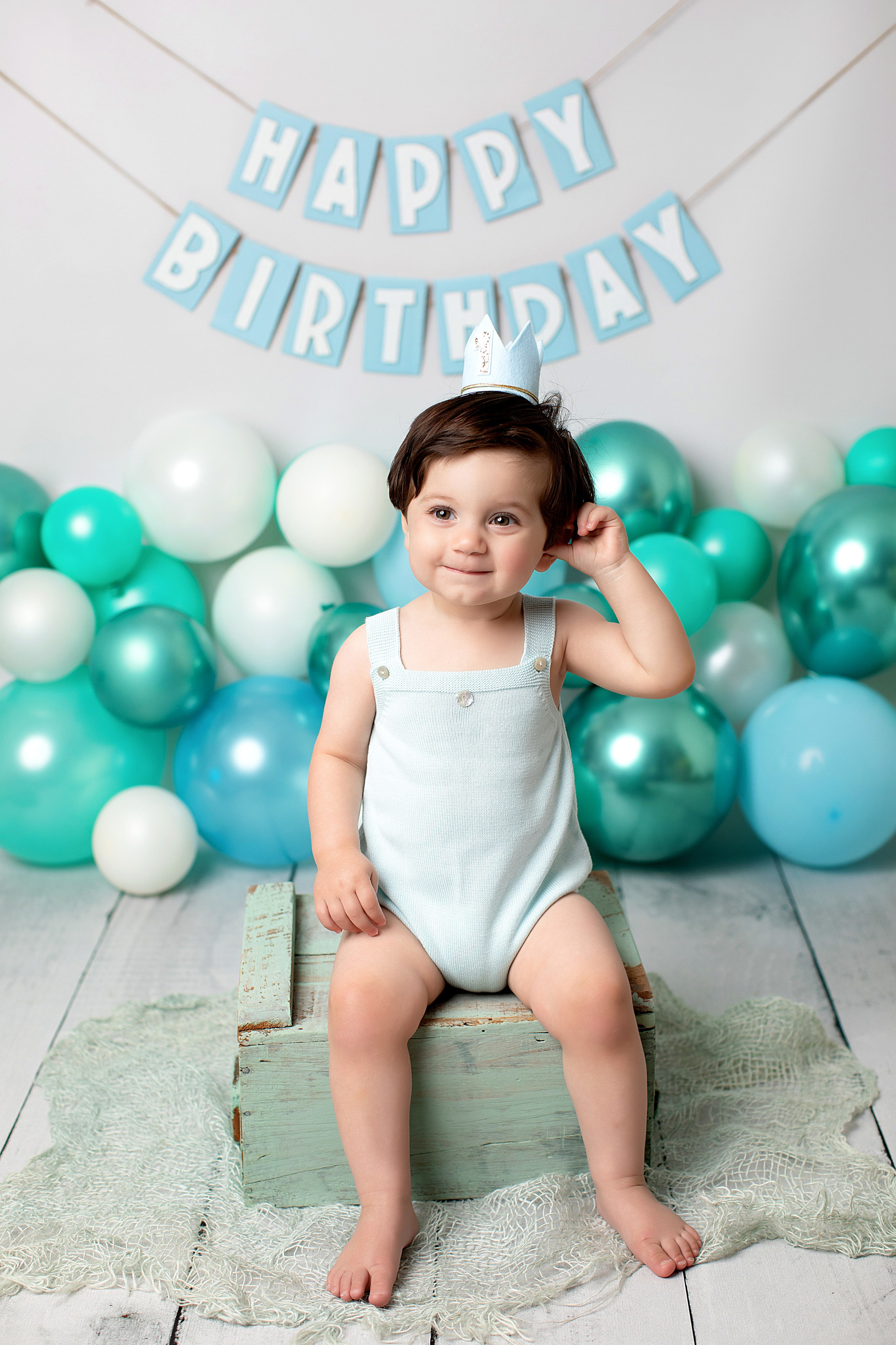 En fotografering för ettåringen fångar glädjen och skrattet på din lilla mästares födelsedag.