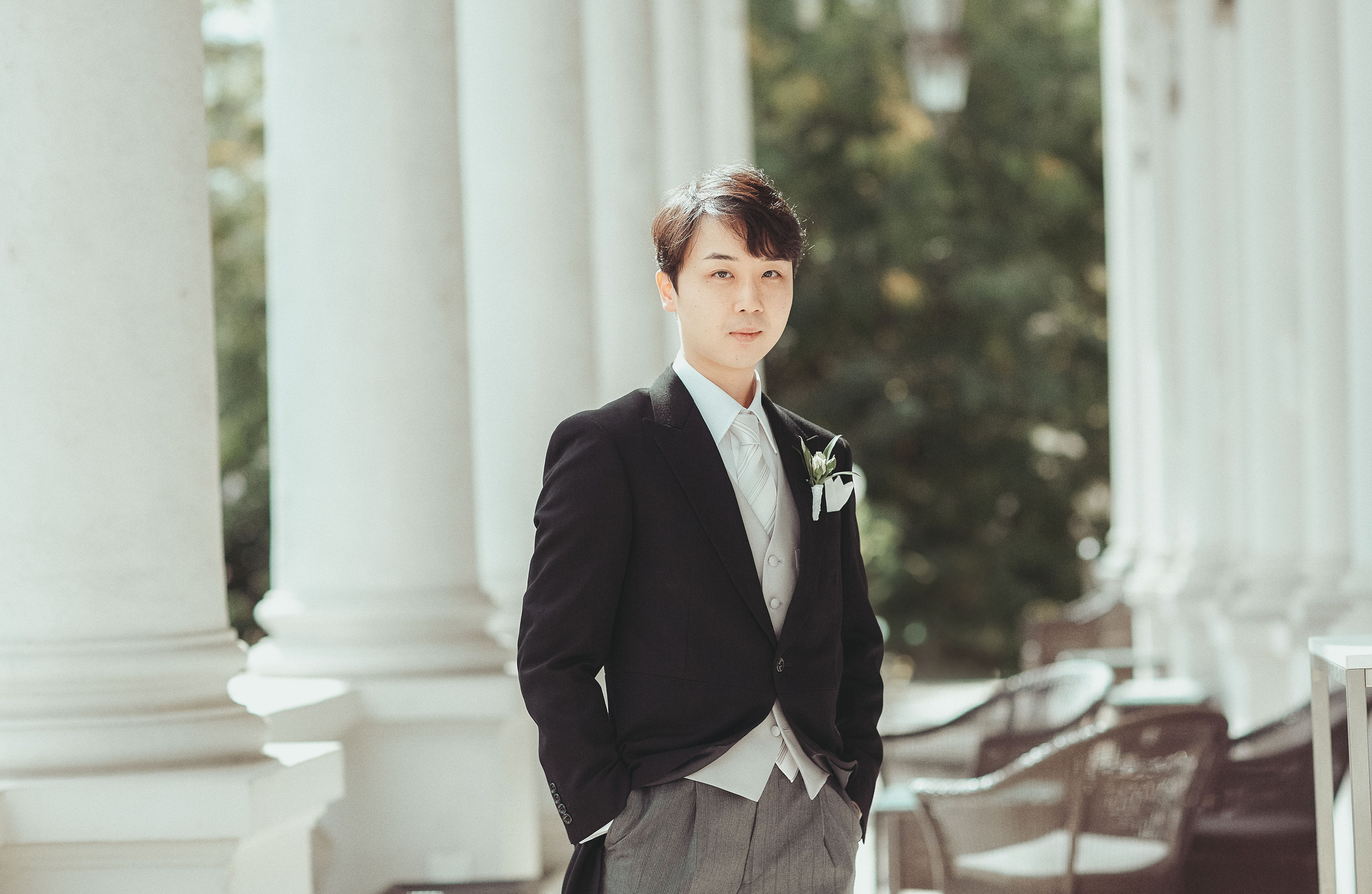 Portrait of the groom on the tarrace. 