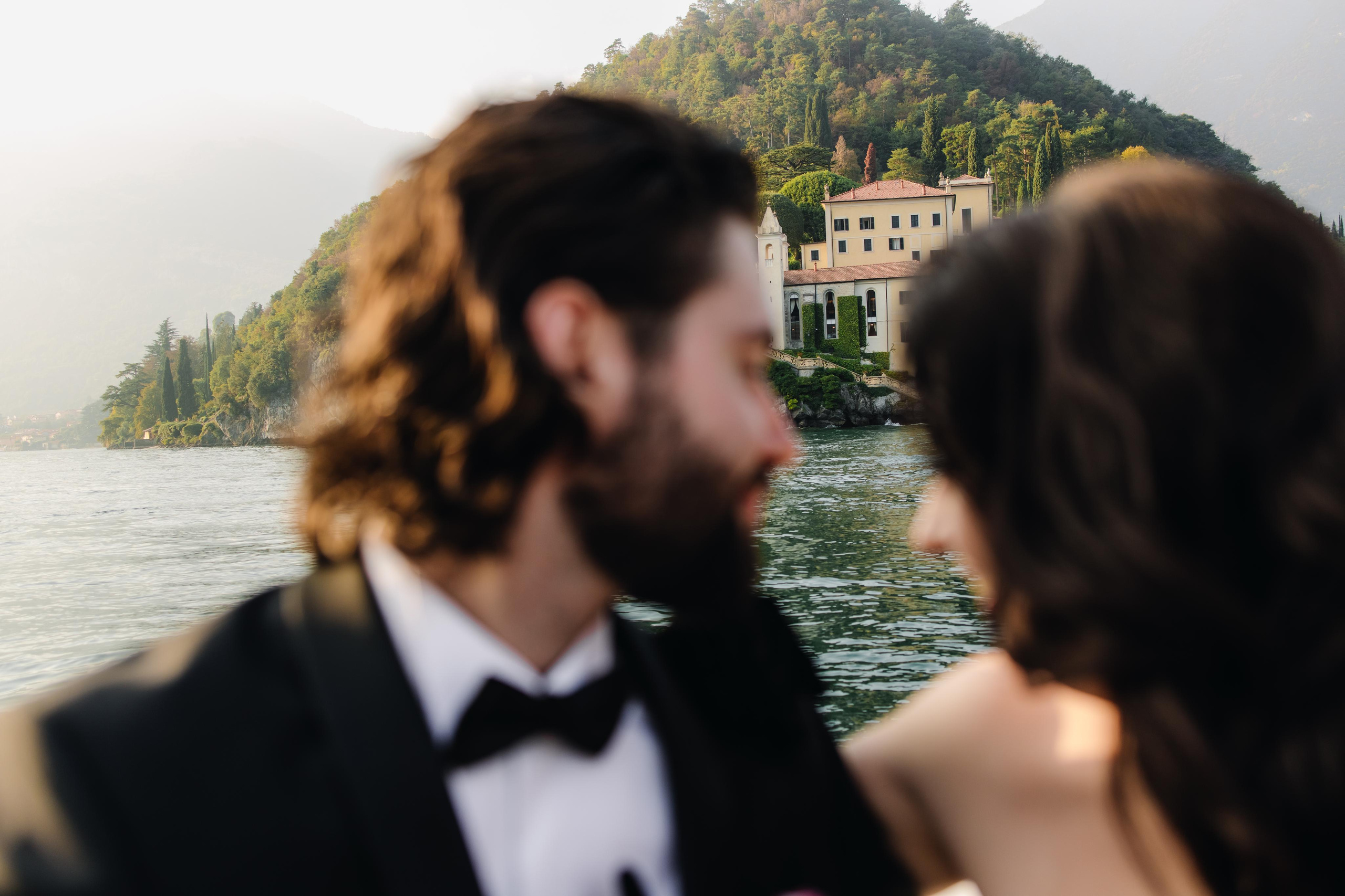 Bride anf groom look at Villa Balbianello on Como