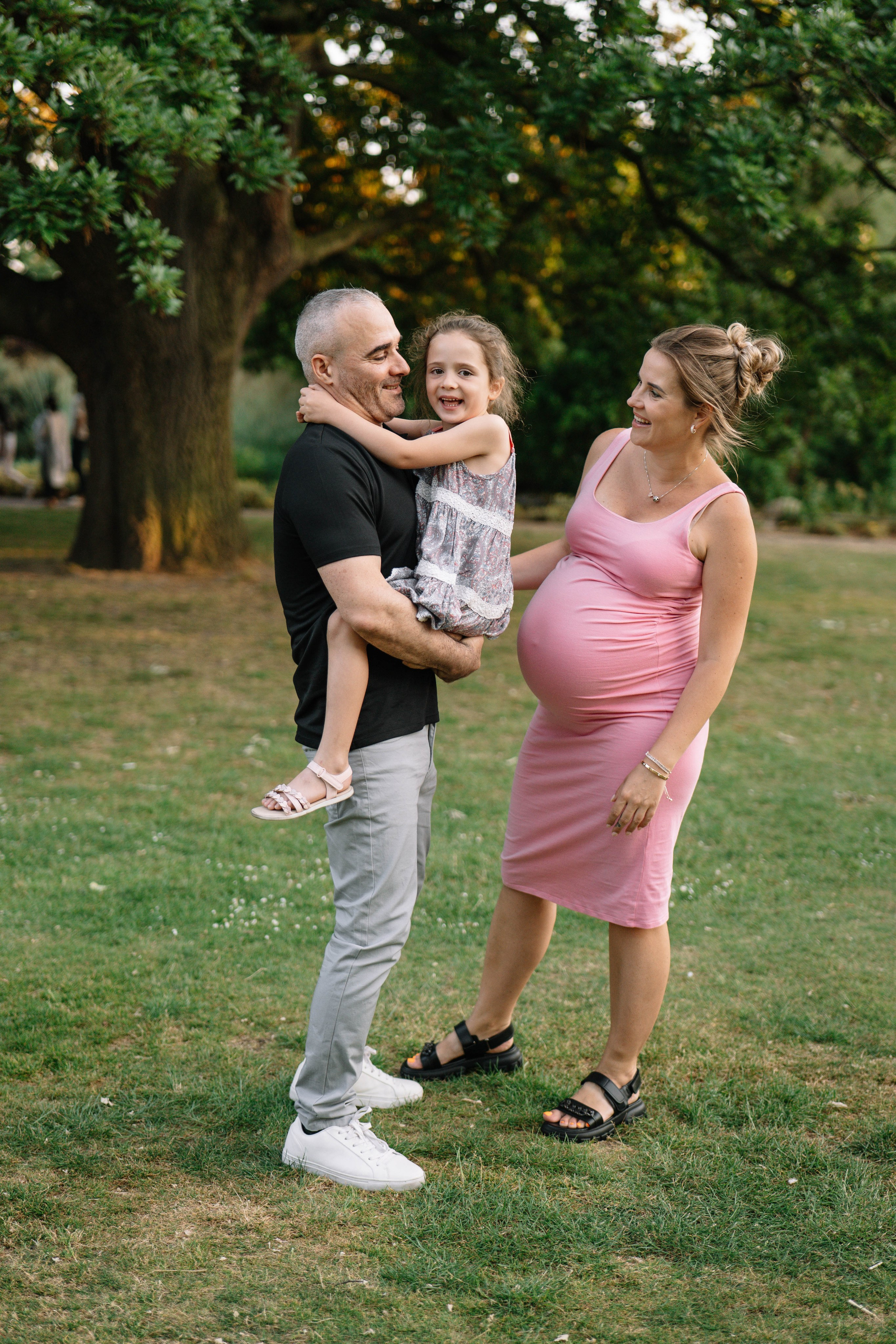 Family in the park. Wedding and family photographer in London