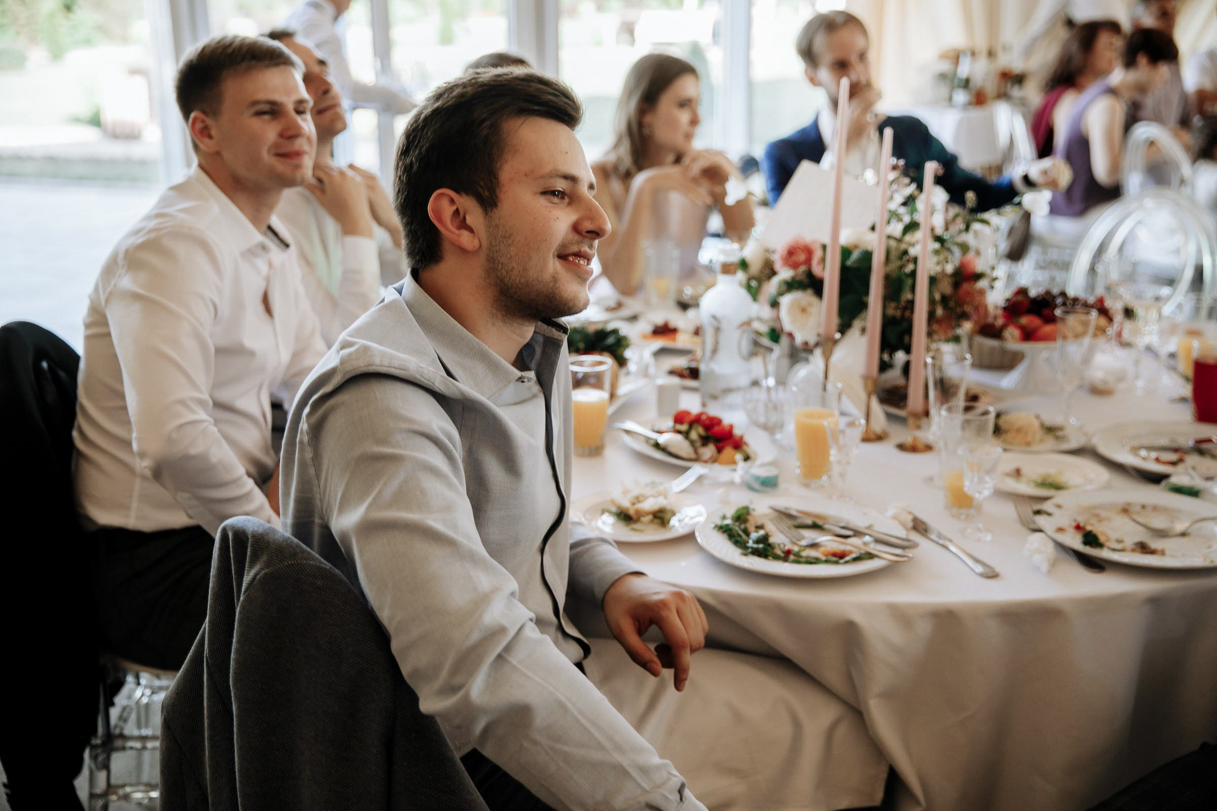 Guest at reception, by Tanya Bodgan, Bude wedding photography.