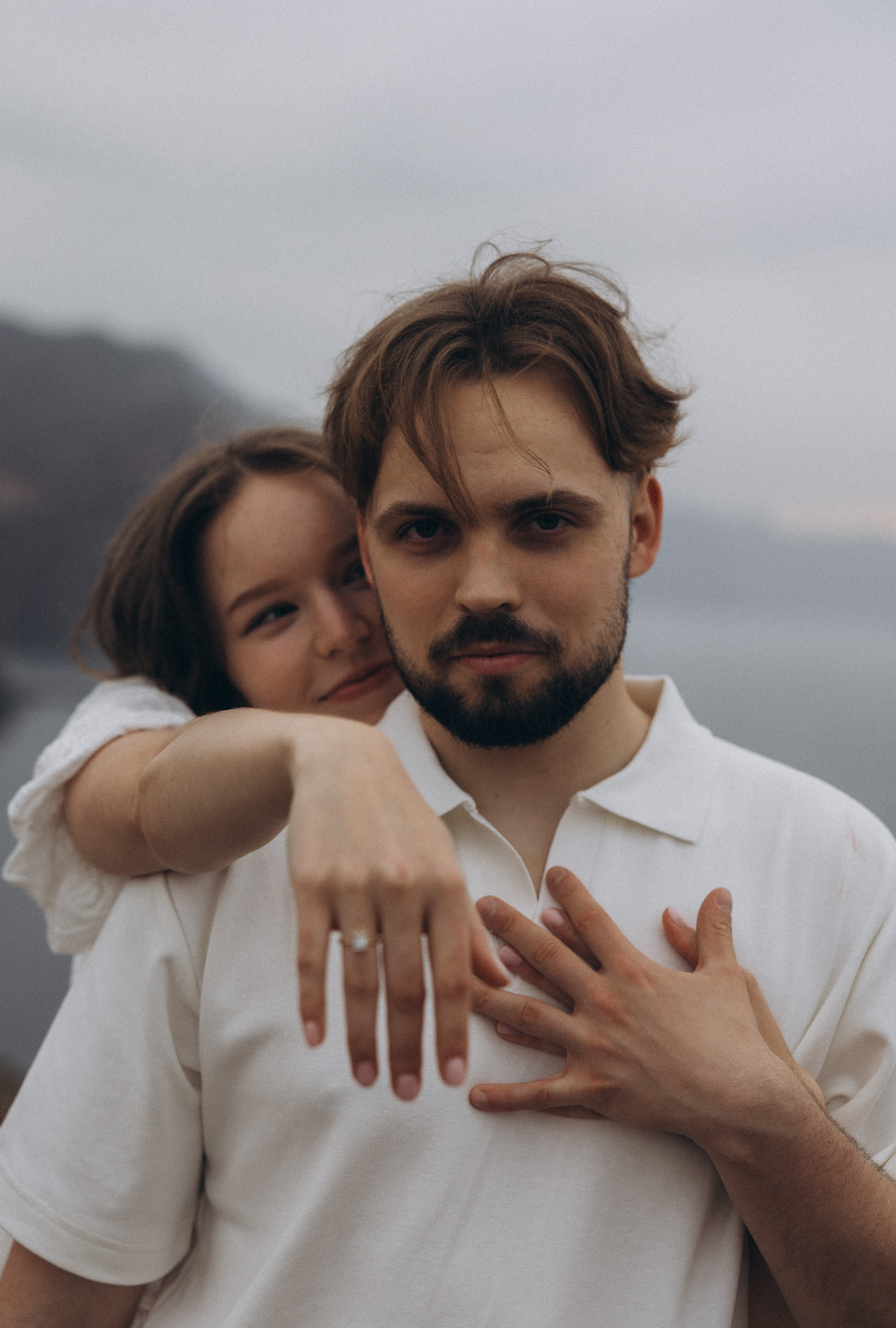Surprise marriage proposal in São Lourenço, Madeira – romantic couple photography on dramatic coastal cliffs