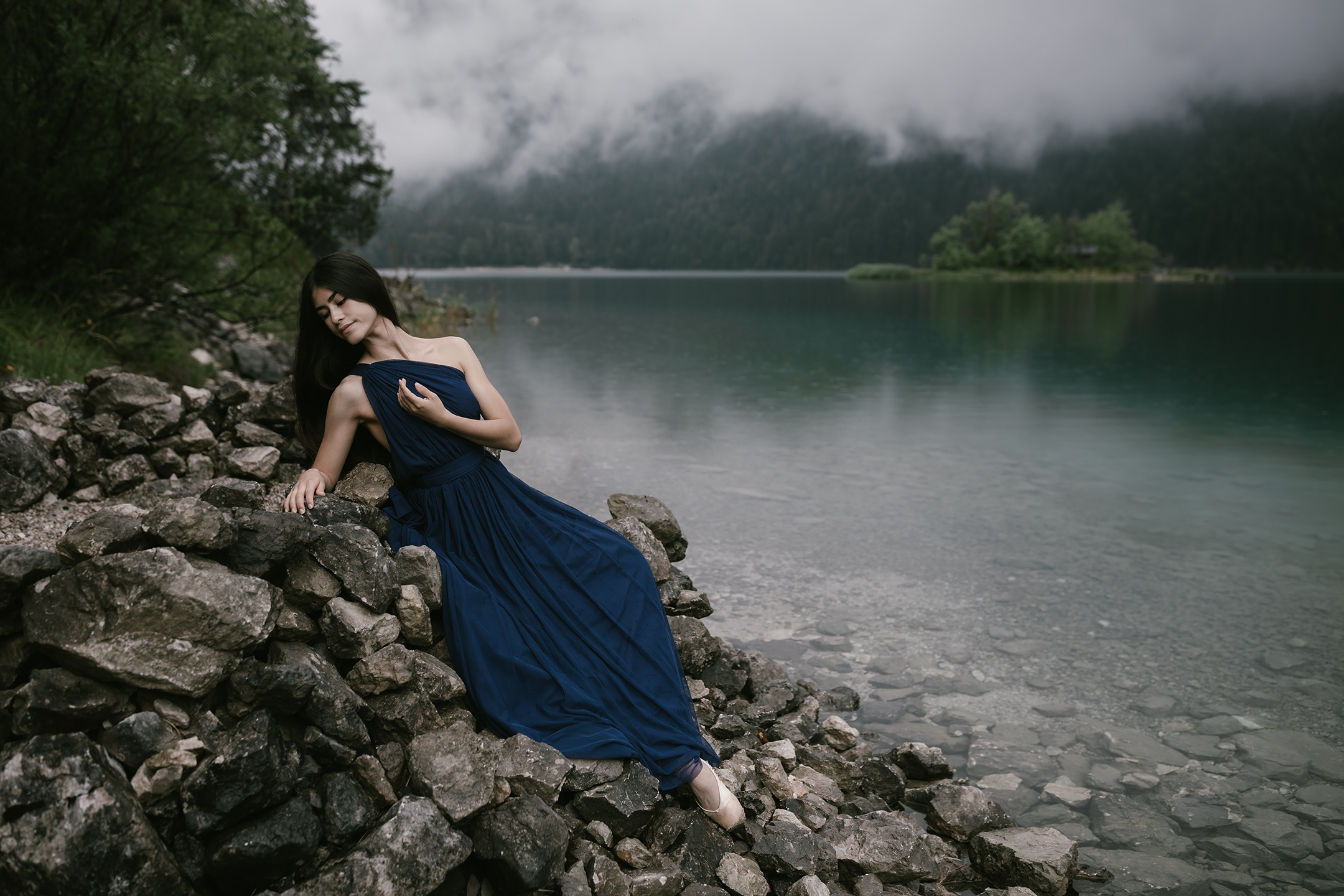 Elegant dance pose by crystal waters of Eibsee